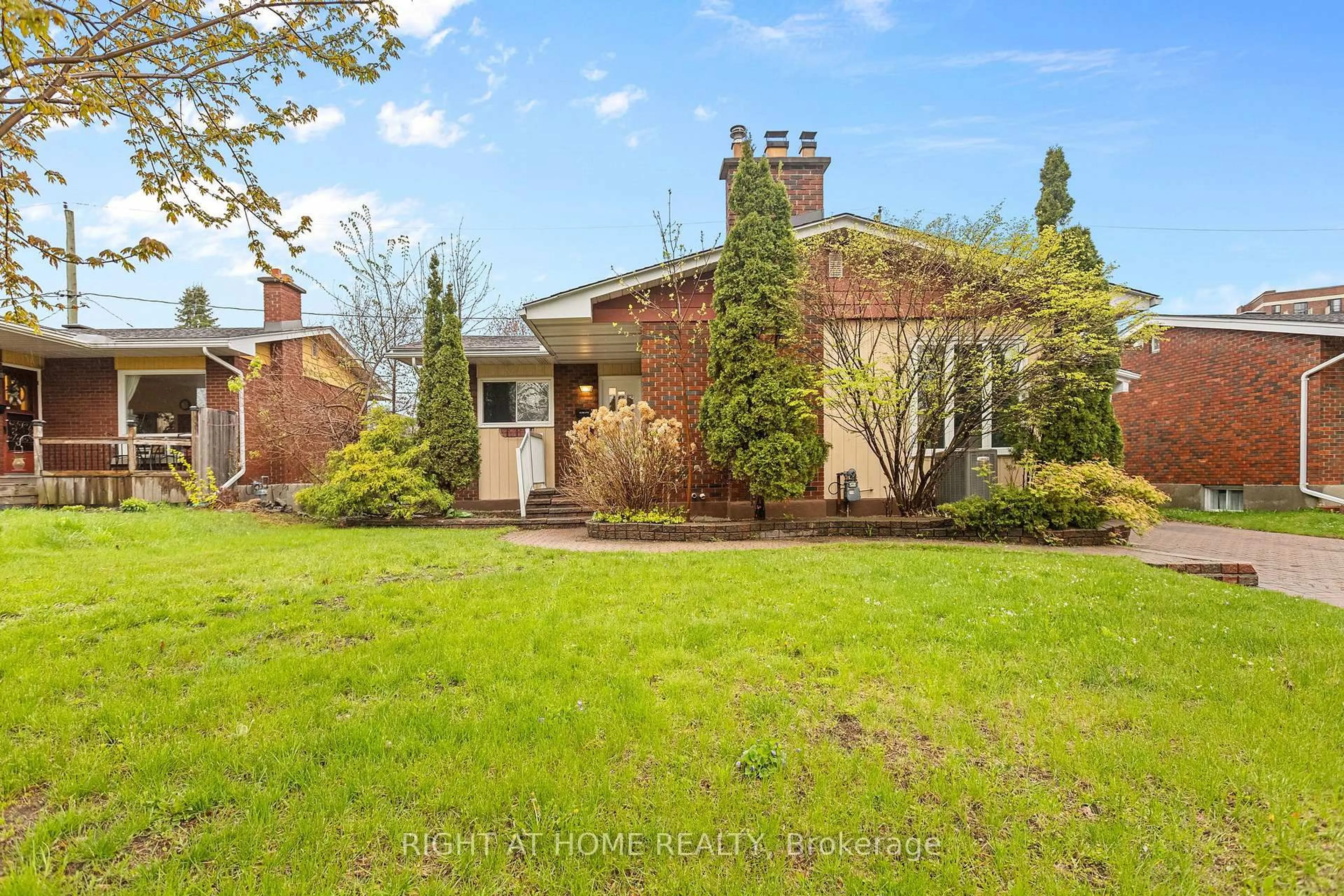 A pic from outside/outdoor area/front of a property/back of a property/a pic from drone, street for 1808 Gilbert Ave, Ottawa Ontario K2C 1A4