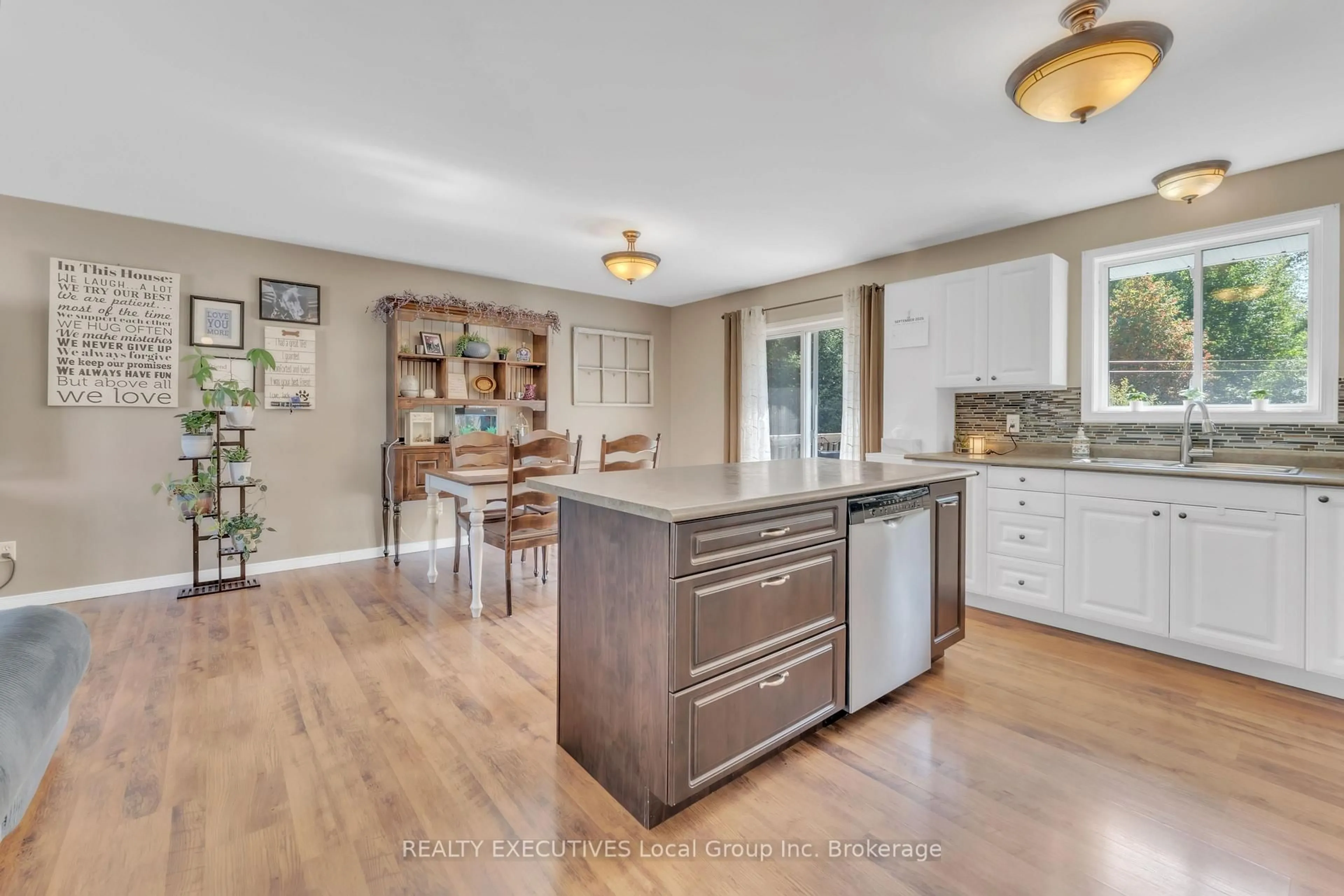 Open concept kitchen, wood/laminate floor for 498 Demers St, West Nipissing Ontario P2B 0A1