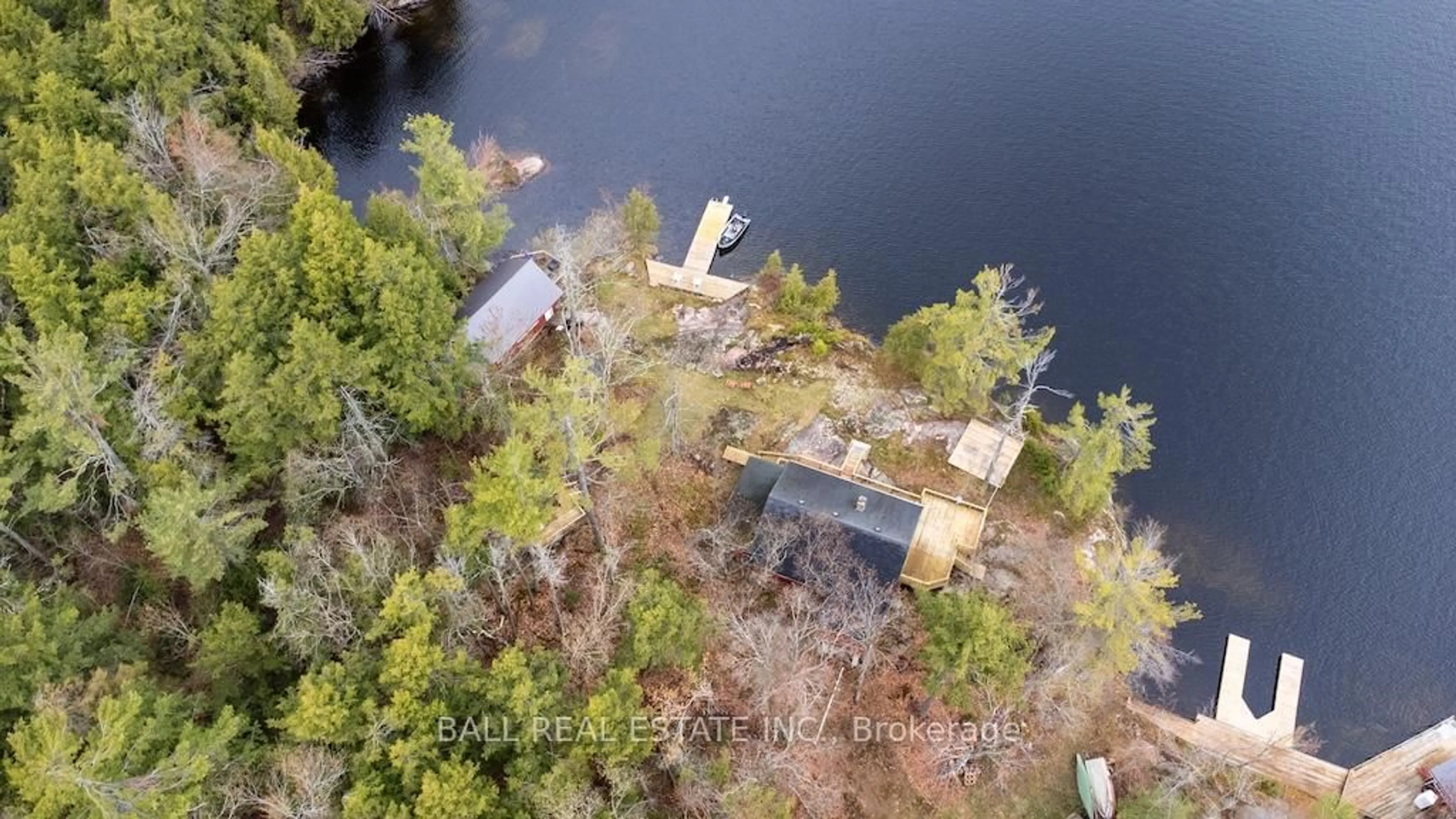 A pic from outside/outdoor area/front of a property/back of a property/a pic from drone, water/lake/river/ocean view for 926 Gilchrist Bay WAO, Douro-Dummer Ontario K0L 2H0