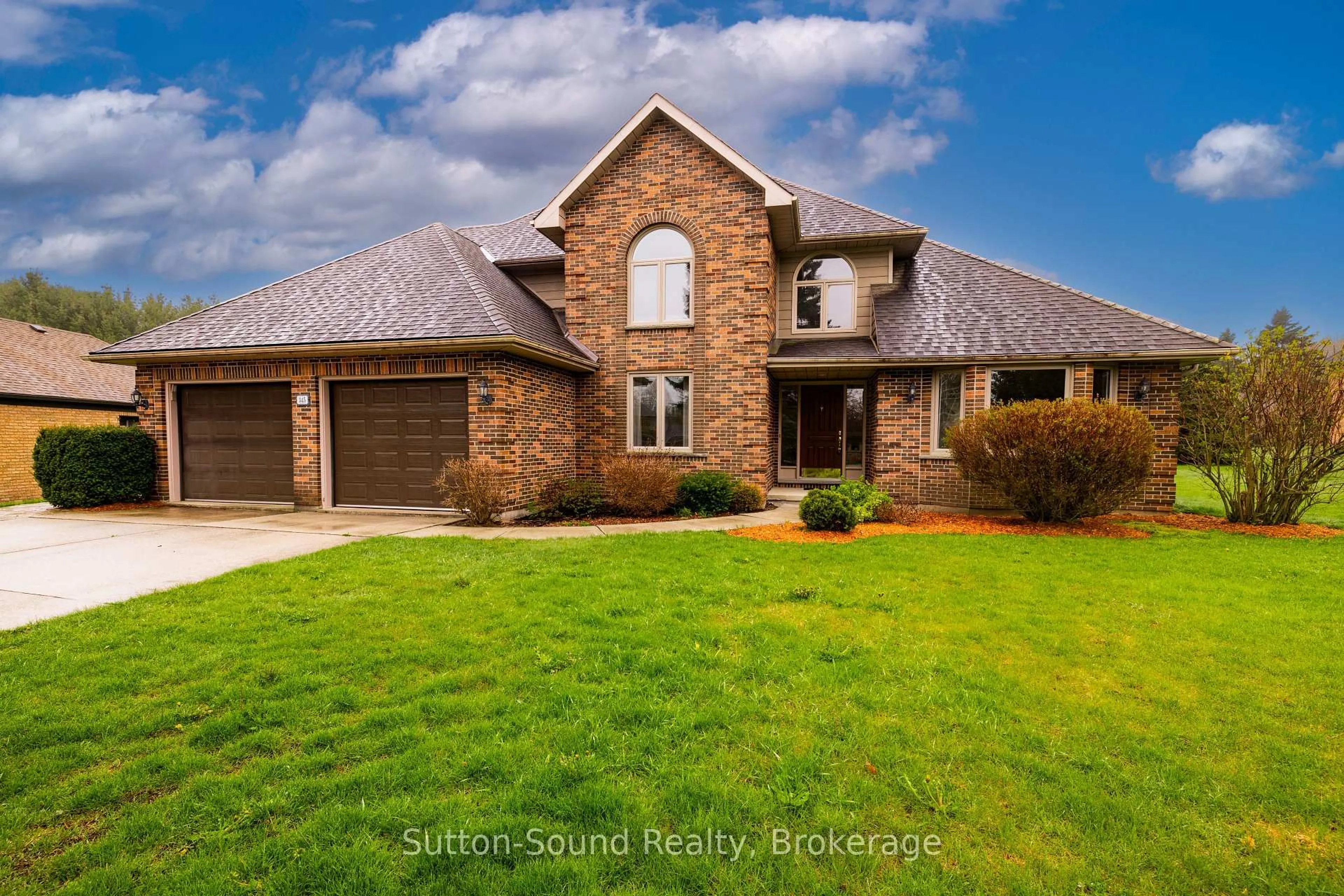 Home with brick exterior material, street for 345 Beechwood Dr, Georgian Bluffs Ontario N4K 5N6