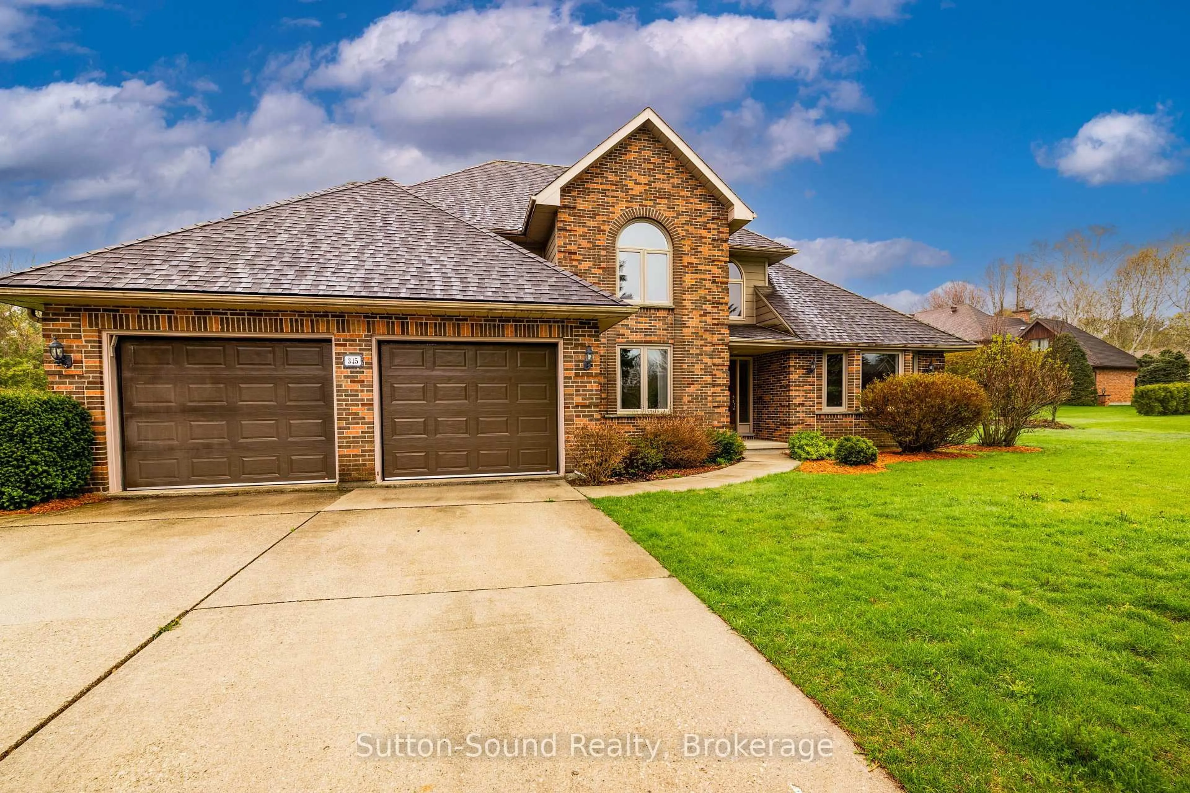 Home with brick exterior material, street for 345 Beechwood Dr, Georgian Bluffs Ontario N4K 5N6