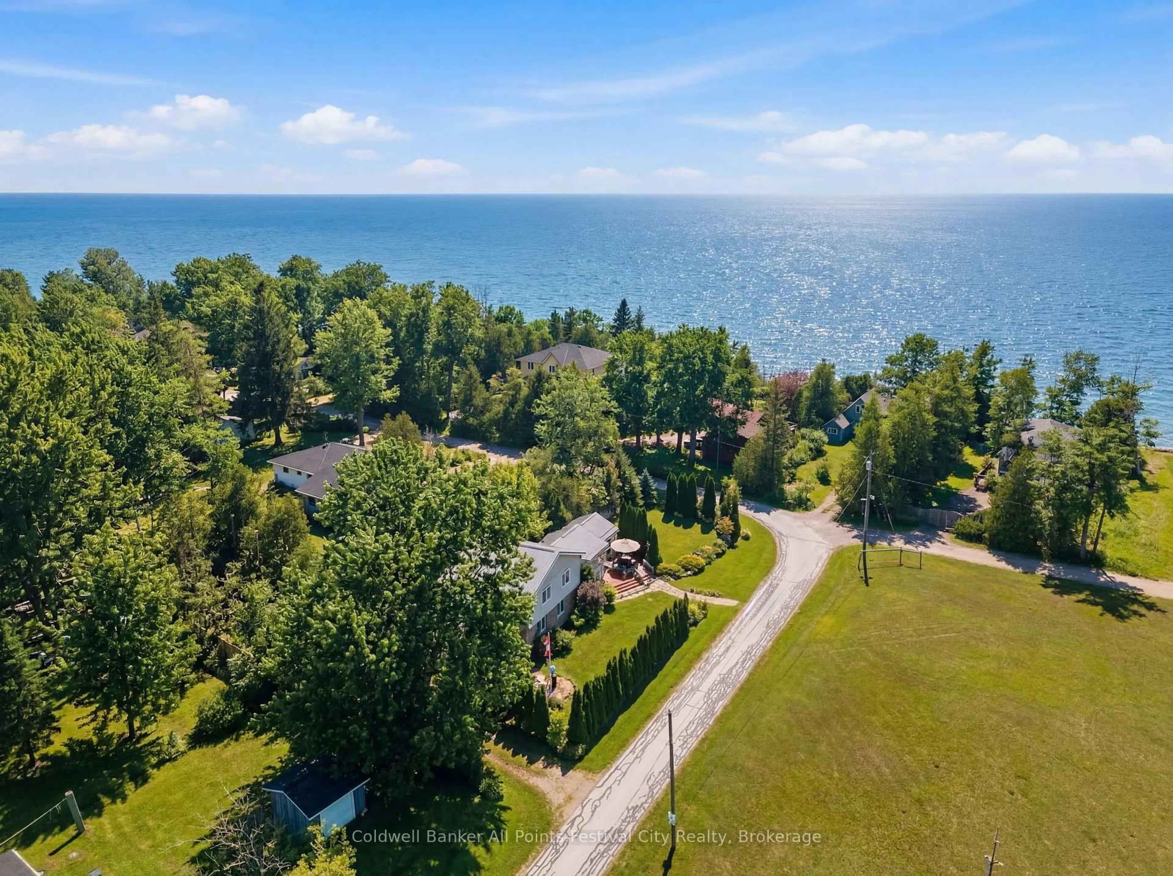 A pic from outside/outdoor area/front of a property/back of a property/a pic from drone, water/lake/river/ocean view for 13 Ravine Park Rd, Central Huron Ontario N7A 3X8