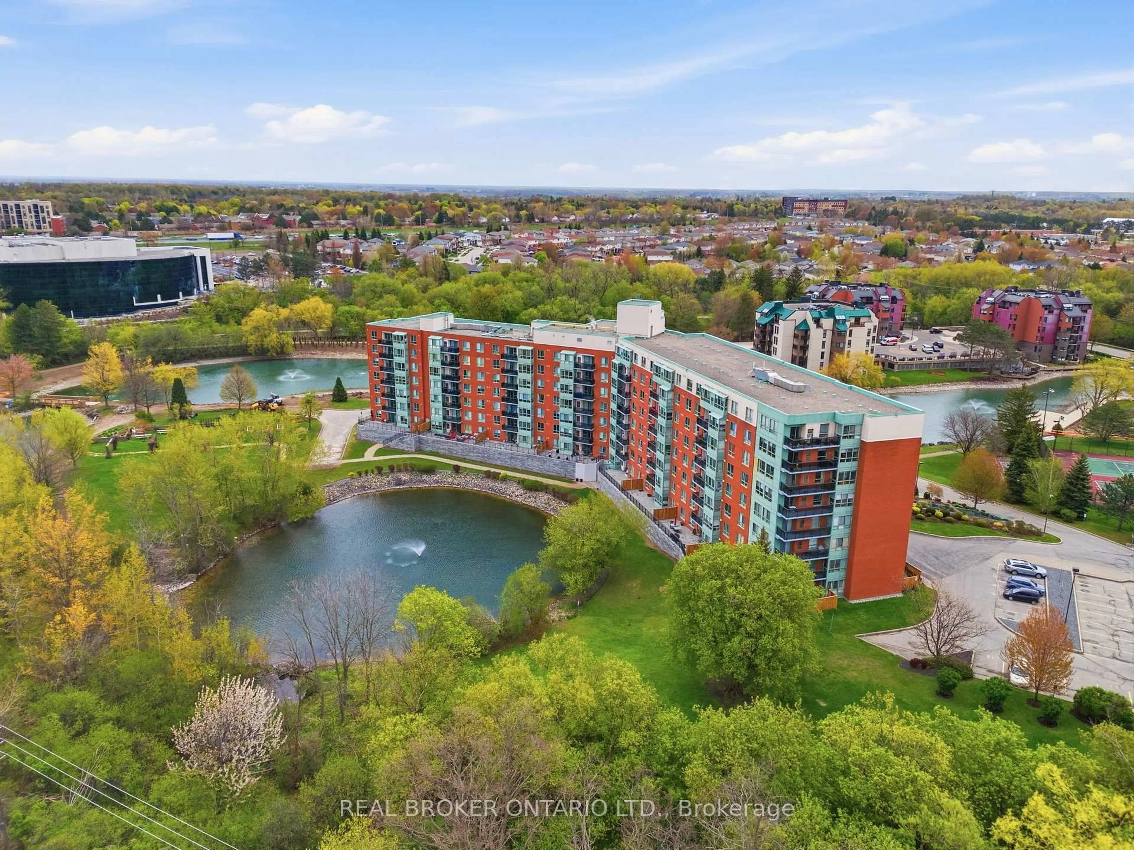 A pic from outside/outdoor area/front of a property/back of a property/a pic from drone, water/lake/river/ocean view for 30 Blue Springs Dr #215, Waterloo Ontario N2J 4T2