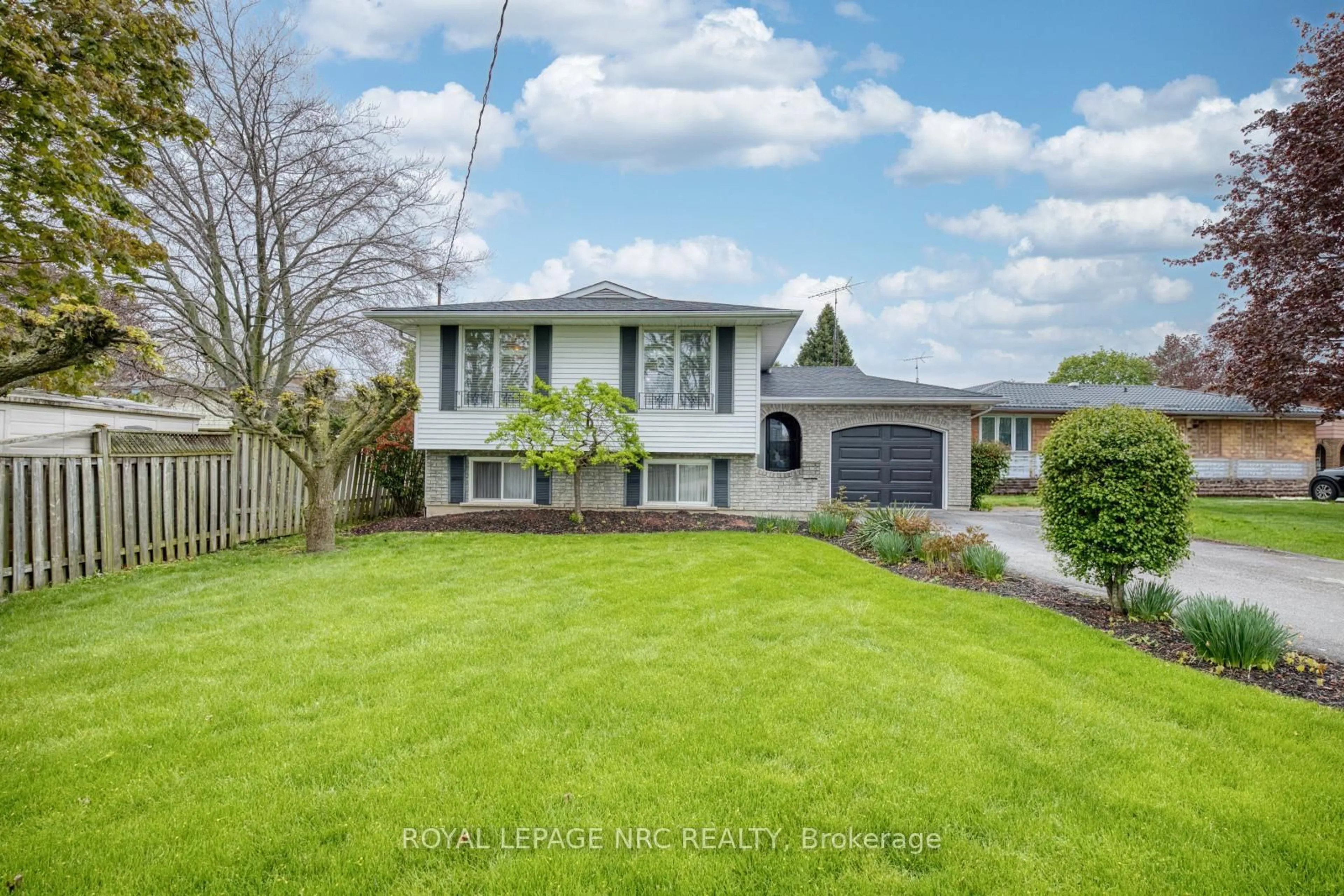 A pic from outside/outdoor area/front of a property/back of a property/a pic from drone, street for 74 Shoreline Dr, St. Catharines Ontario L2N 6H7