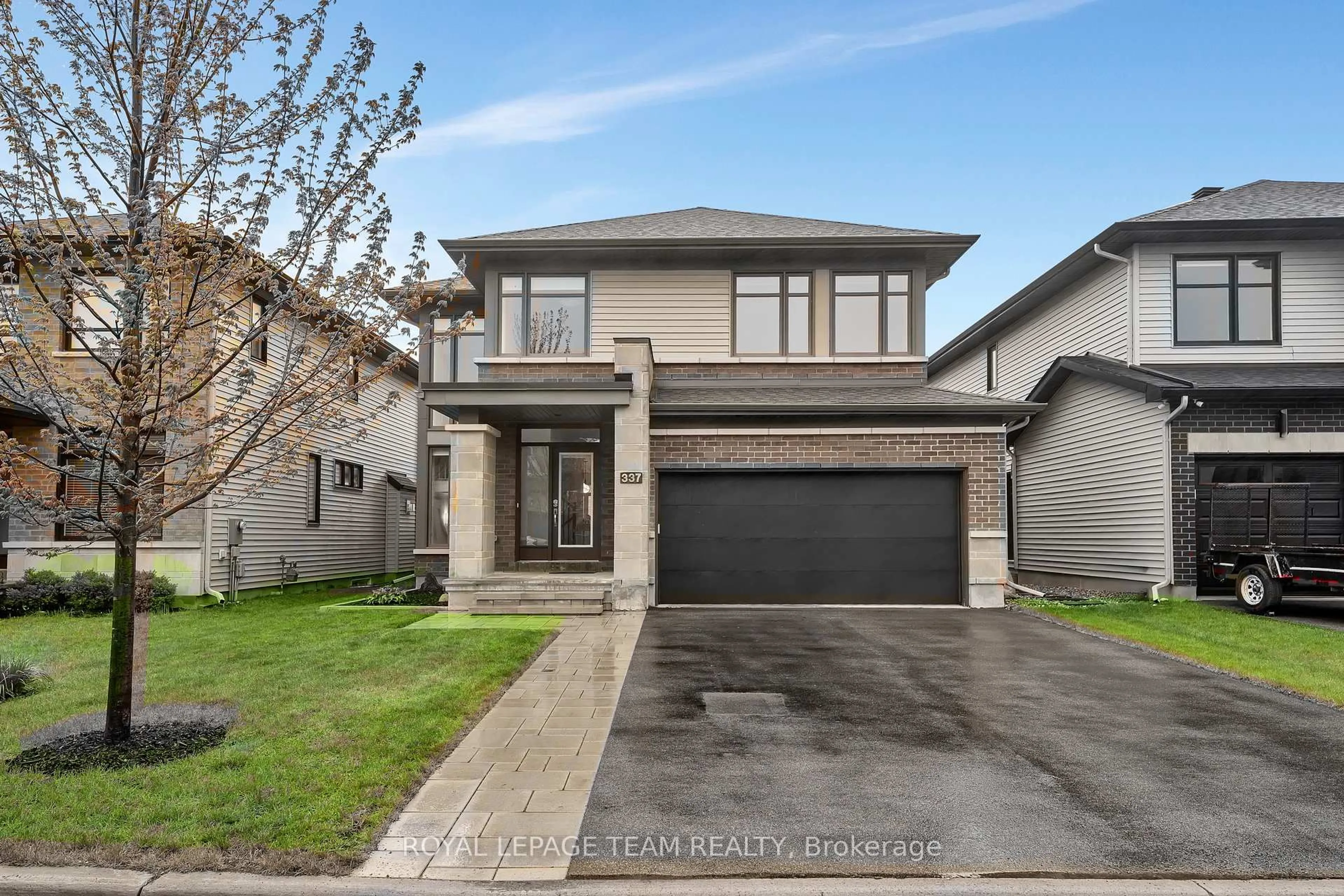 Home with brick exterior material, street for 337 Serenade Cres, Ottawa Ontario K1X 0B9