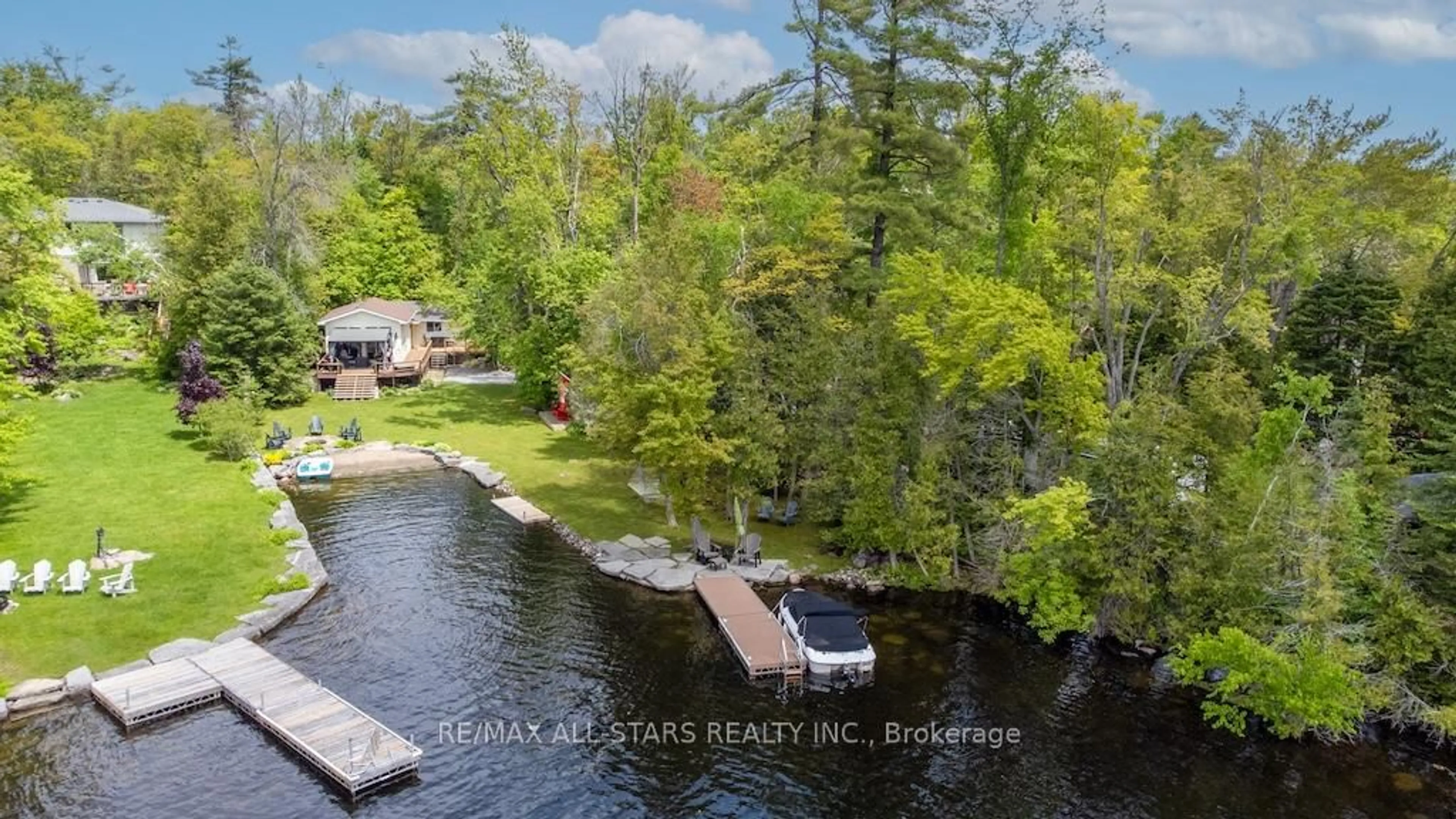 A pic from outside/outdoor area/front of a property/back of a property/a pic from drone, water/lake/river/ocean view for 6 Fire Route 14B Rte, Trent Lakes Ontario K0L 1J0