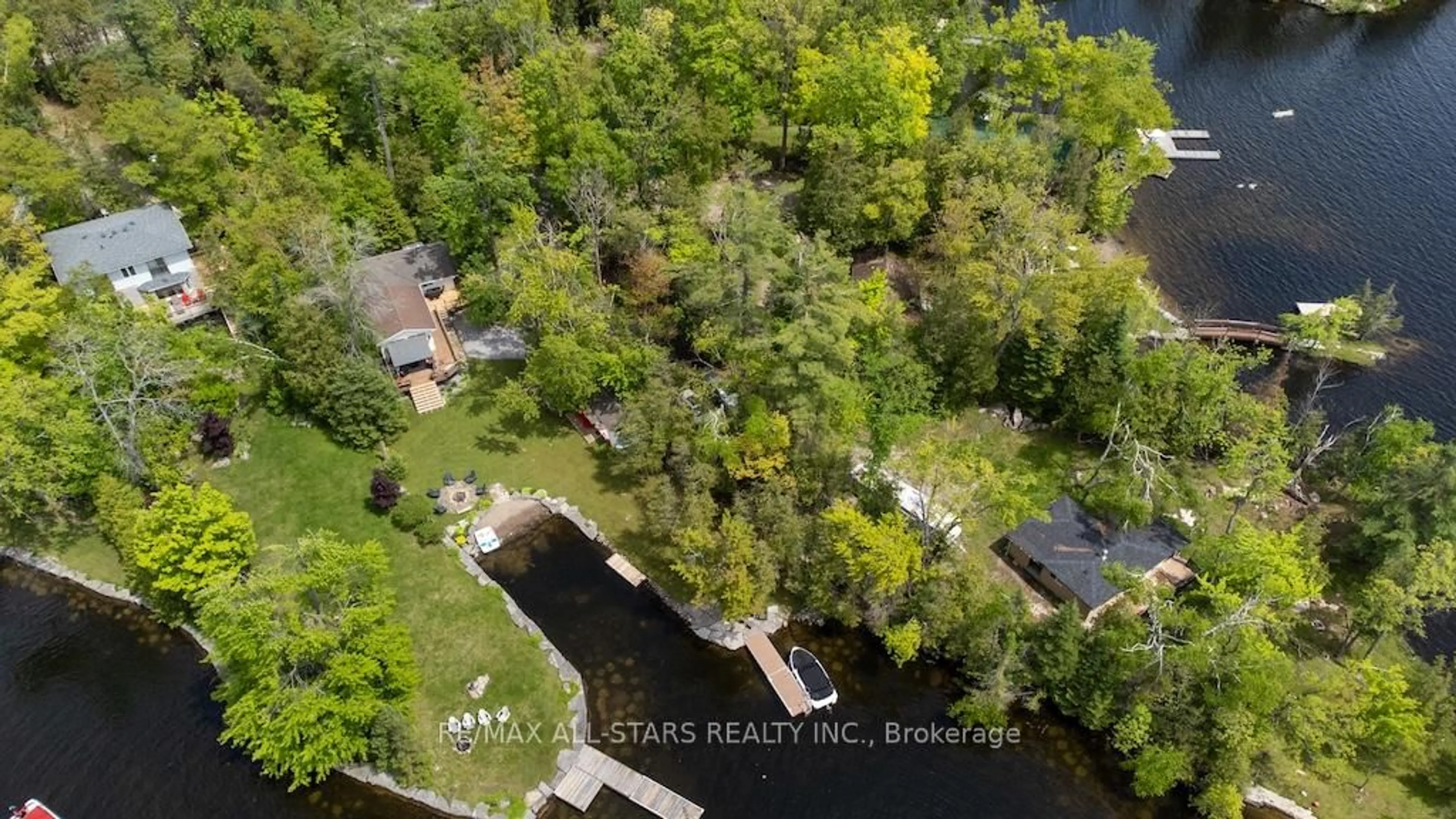 A pic from outside/outdoor area/front of a property/back of a property/a pic from drone, water/lake/river/ocean view for 6 Fire Route 14B Rte, Trent Lakes Ontario K0L 1J0