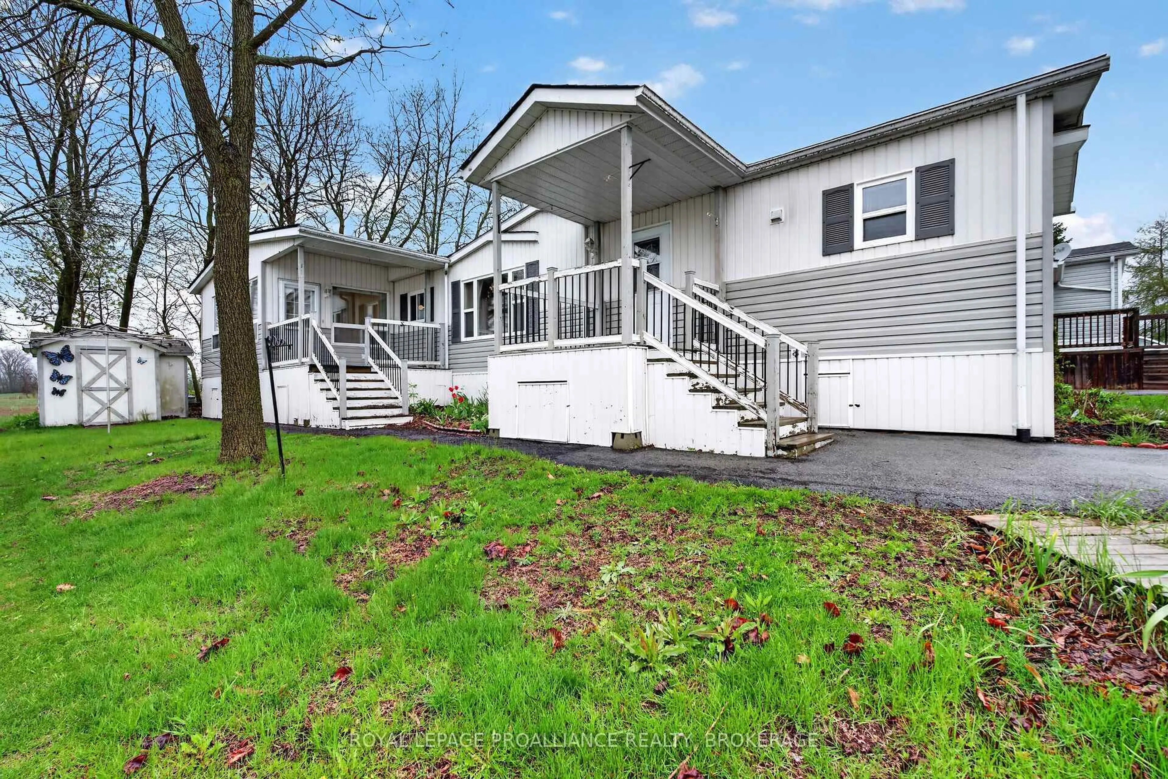 Home with vinyl exterior material, water/lake/river/ocean view for 1 Elm St, Greater Napanee Ontario K7R 0E9