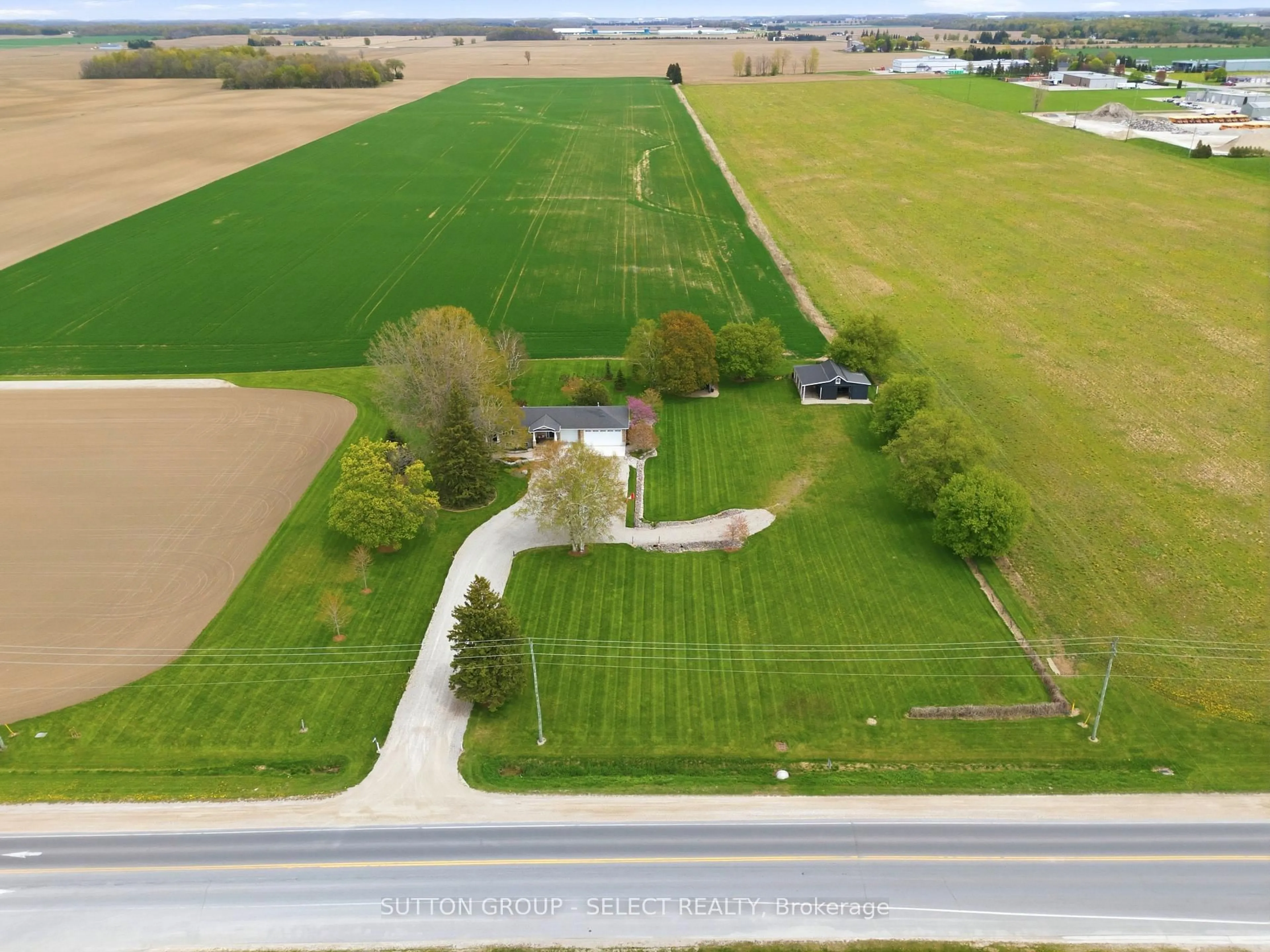 A pic from outside/outdoor area/front of a property/back of a property/a pic from drone, street for 71294 LONDON Rd, South Huron Ontario N0M 1S3