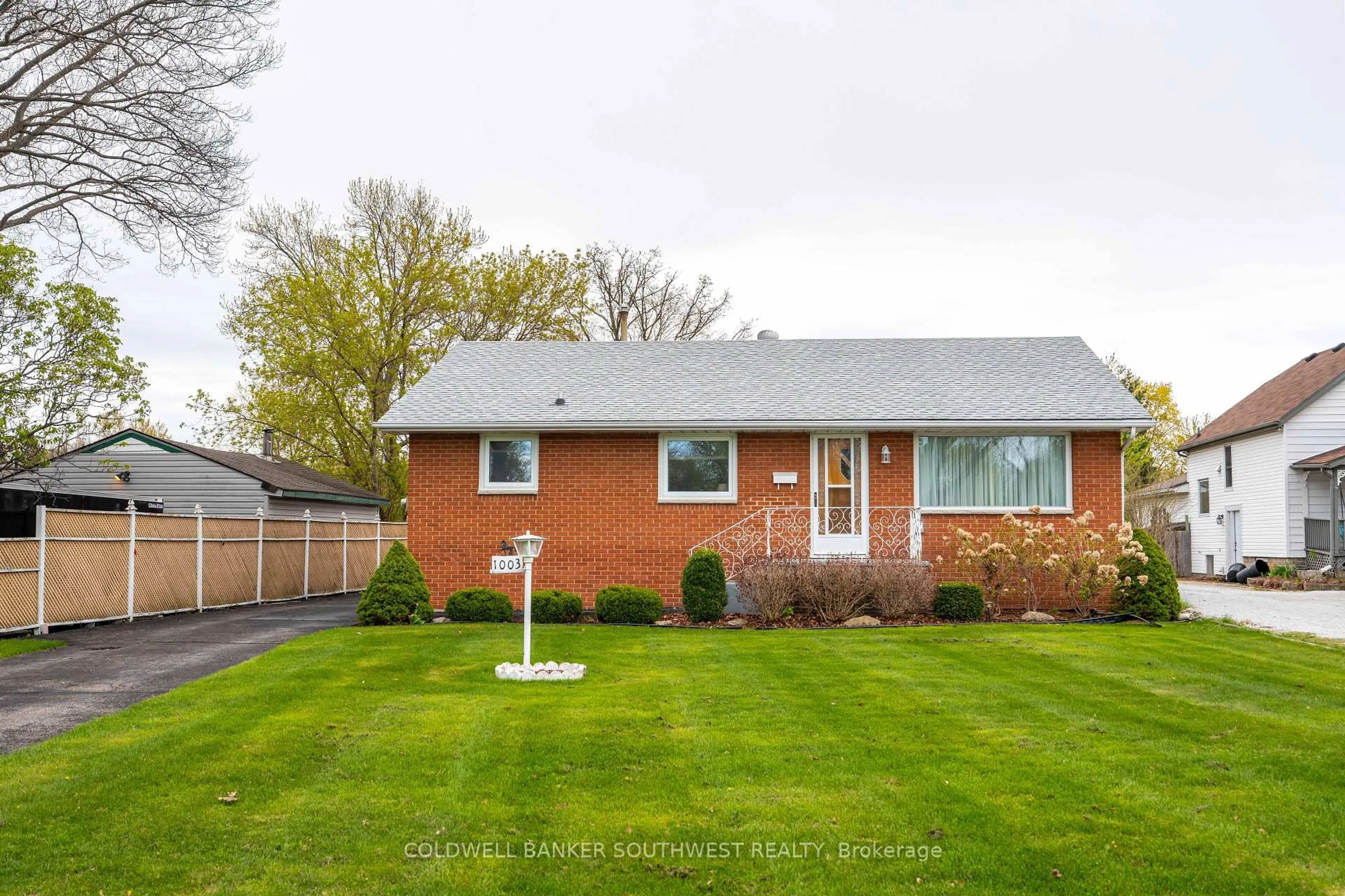 Home with brick exterior material, street for 1003 Michigan Ave, Sarnia Ontario N7T 7B7