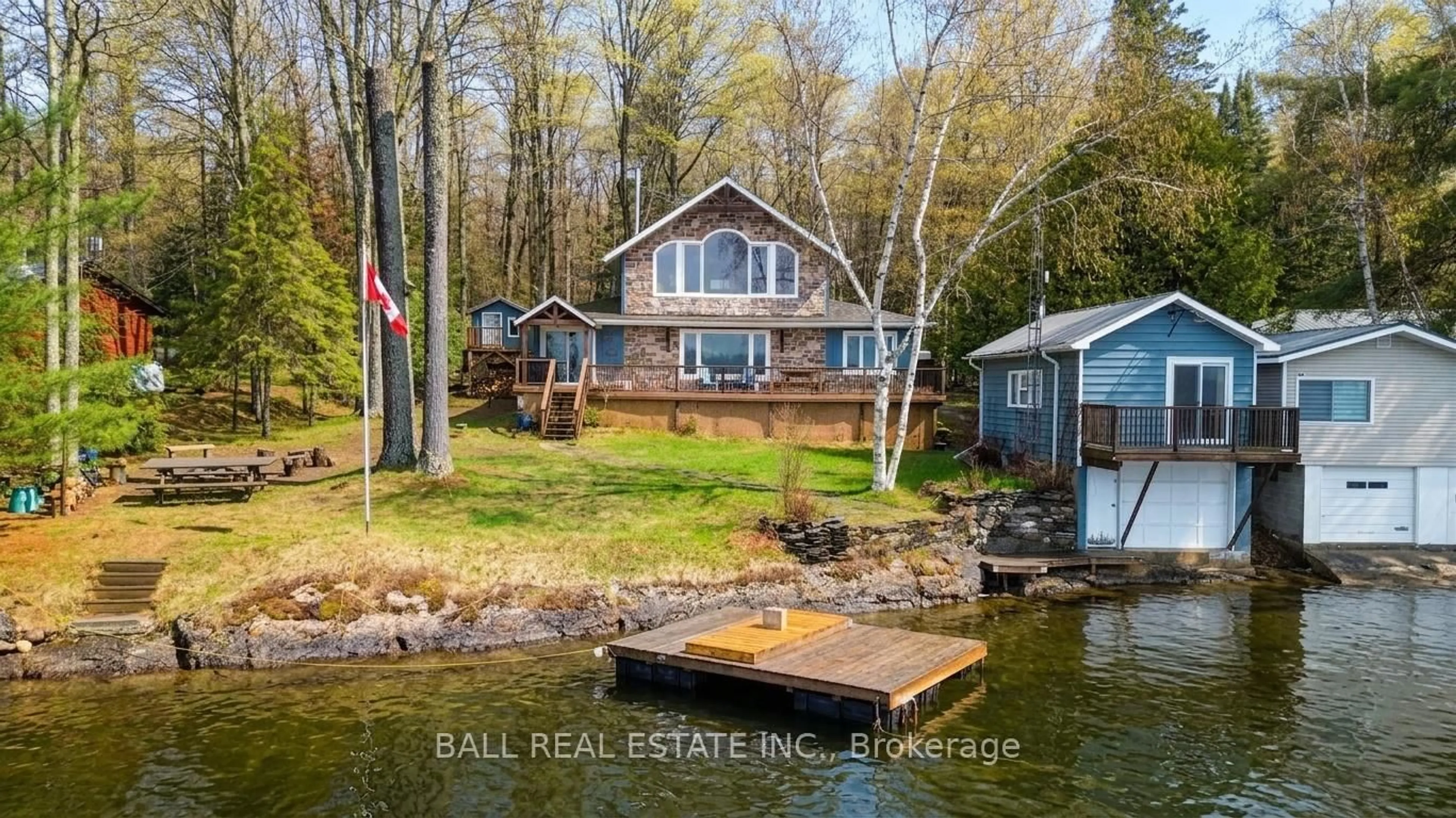 A pic from outside/outdoor area/front of a property/back of a property/a pic from drone, water/lake/river/ocean view for 205 Moffat Rd, North Kawartha Ontario K0L 1A0