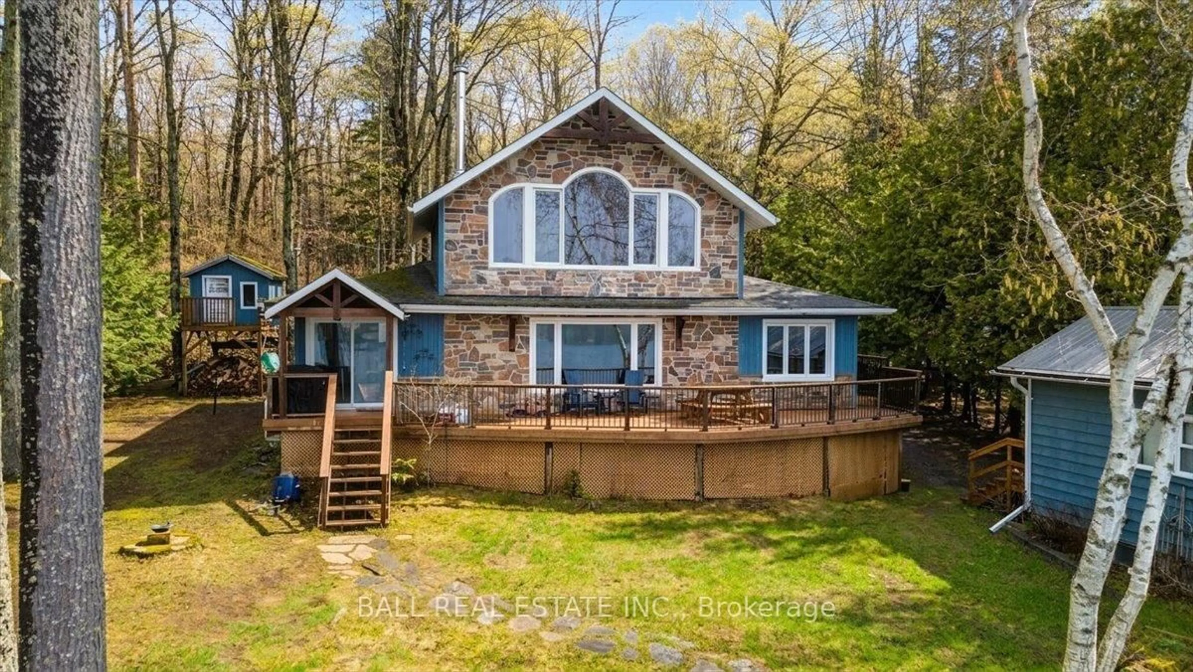 A pic from outside/outdoor area/front of a property/back of a property/a pic from drone, water/lake/river/ocean view for 205 Moffat Rd, North Kawartha Ontario K0L 1A0