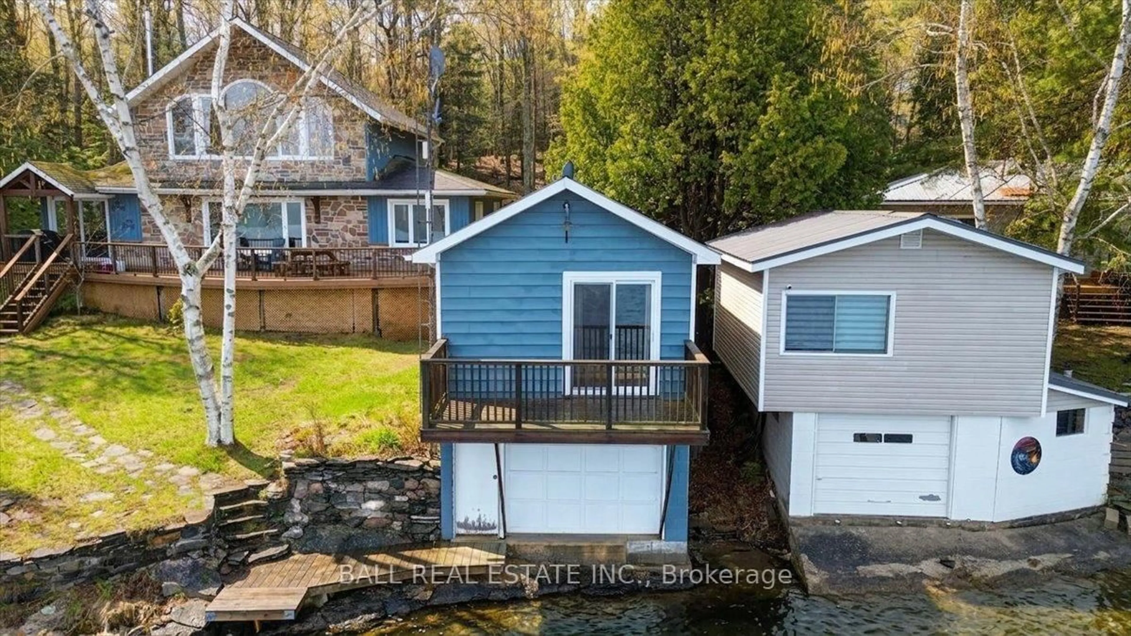 A pic from outside/outdoor area/front of a property/back of a property/a pic from drone, water/lake/river/ocean view for 205 Moffat Rd, North Kawartha Ontario K0L 1A0