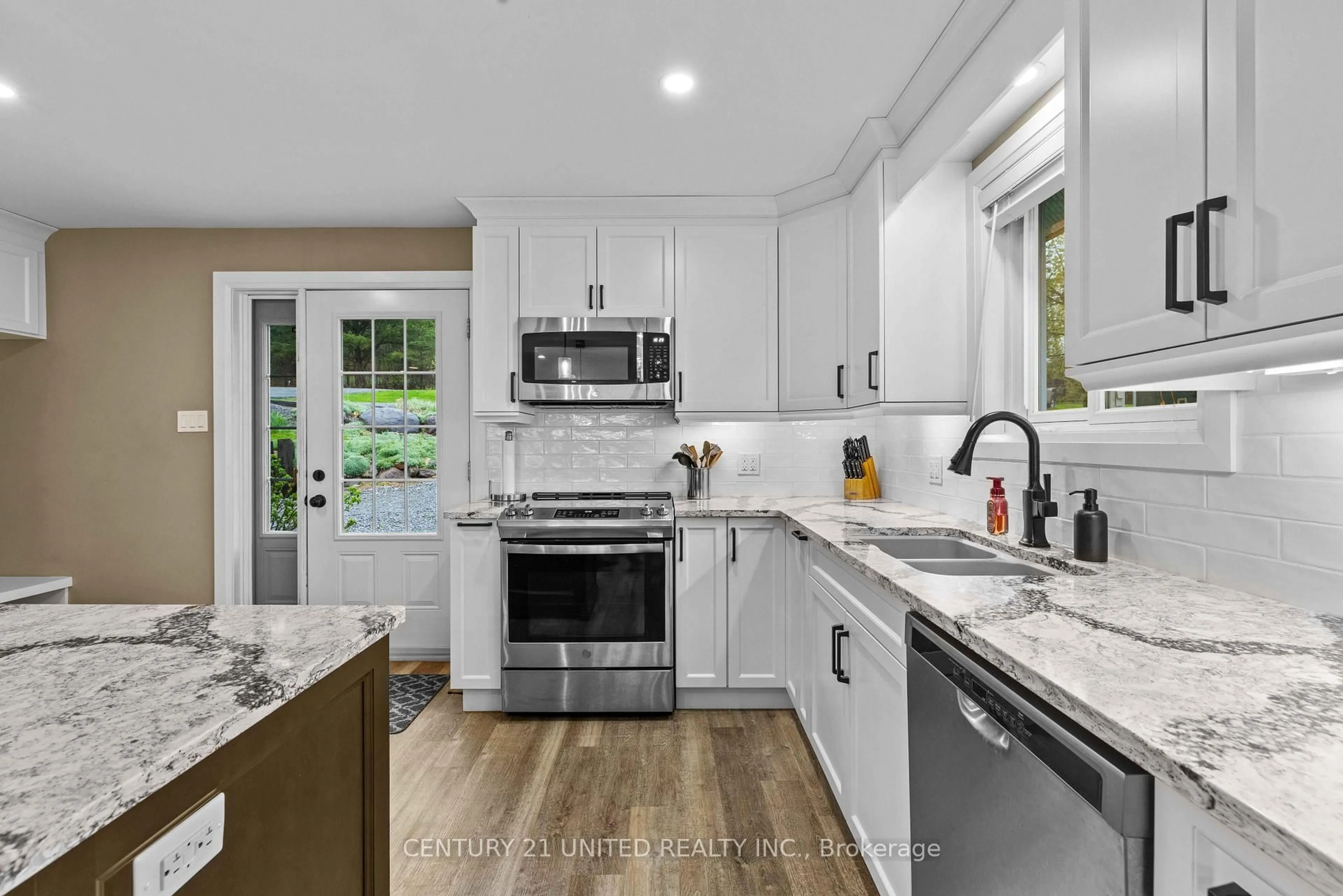Open concept kitchen, ceramic/tile floor for 385 Kents Bay Rd, Otonabee-South Monaghan Ontario K9J 6X8