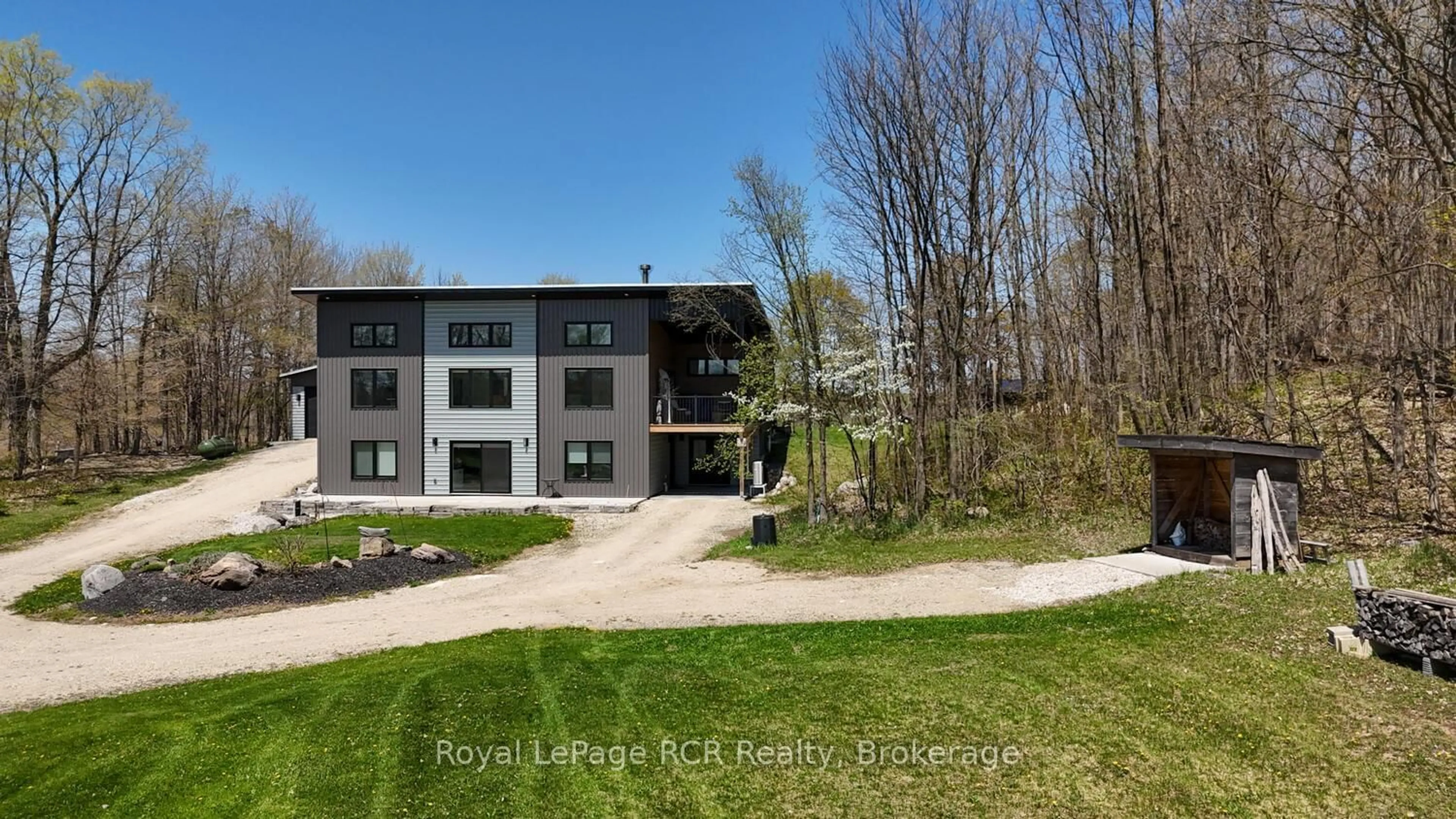 A pic from outside/outdoor area/front of a property/back of a property/a pic from drone, unknown for 384317 Concession 4 Concession, West Grey Ontario N0C 1K0
