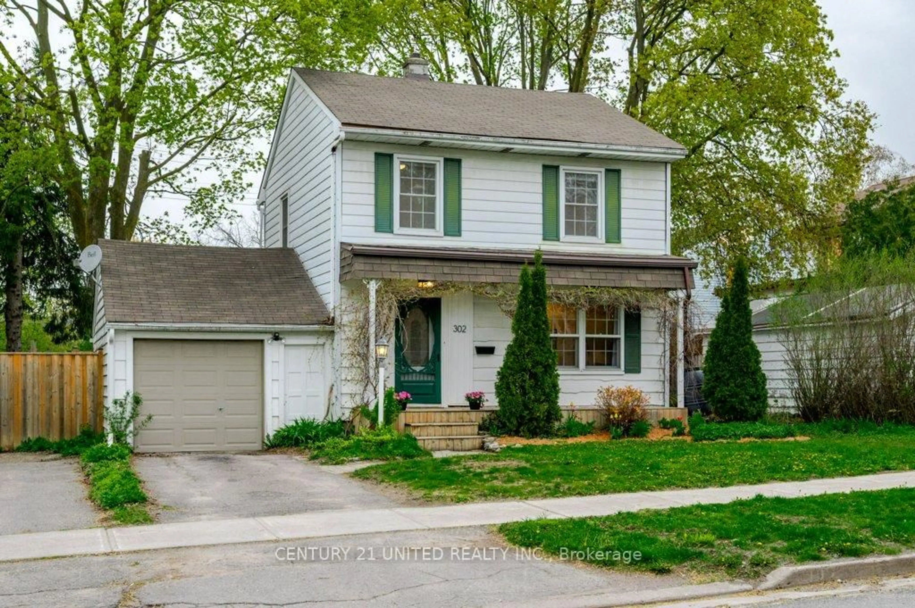 Home with vinyl exterior material, street for 302 Mason Ave, Peterborough Ontario K9H 4W5