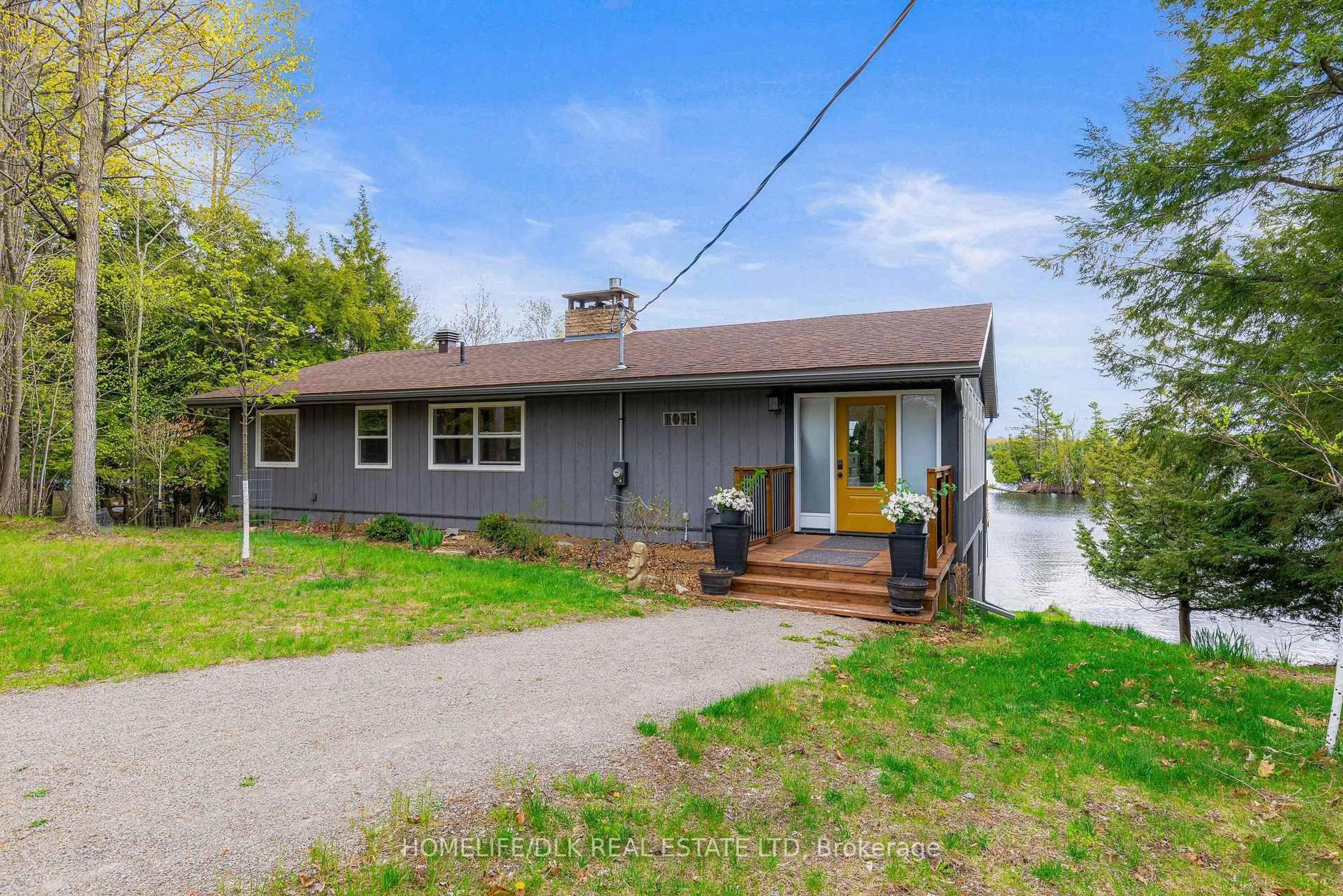 A pic from outside/outdoor area/front of a property/back of a property/a pic from drone, street for 777 Indian Lake Rd, Rideau Lakes Ontario K0G 1E0