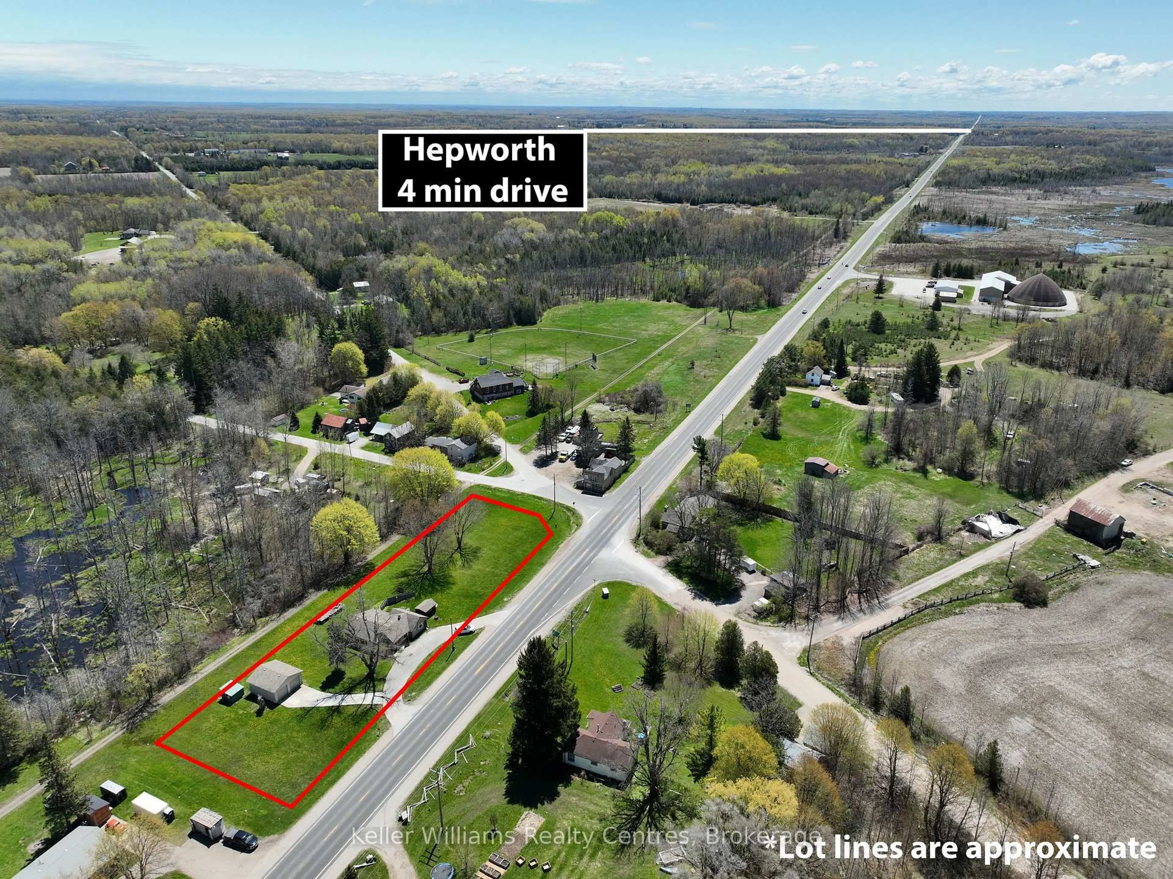 A pic from outside/outdoor area/front of a property/back of a property/a pic from drone, street for 19549 Highway 6, Georgian Bluffs Ontario N0H 2T0