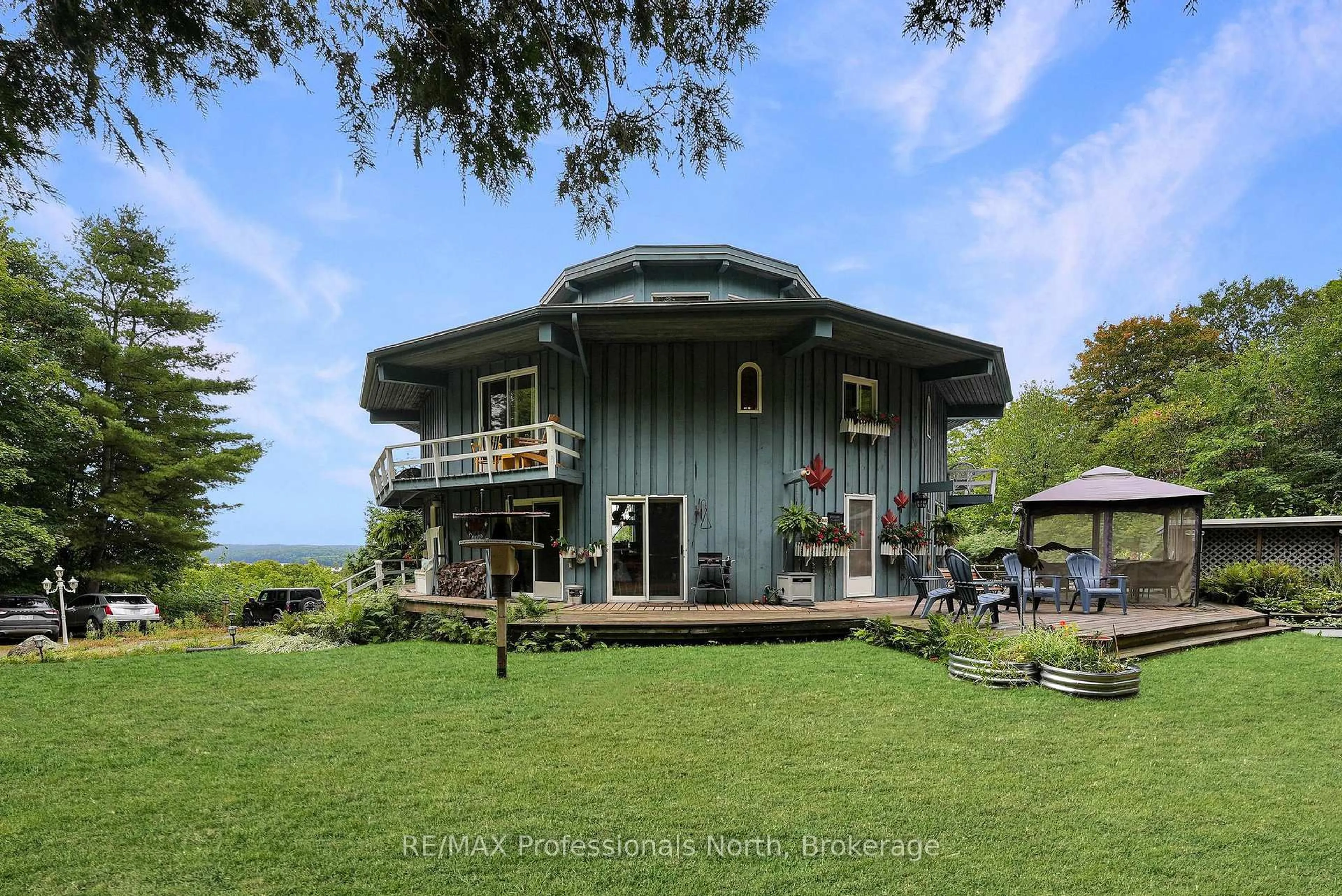A pic from outside/outdoor area/front of a property/back of a property/a pic from drone, water/lake/river/ocean view for 17359 Highway 35, Algonquin Highlands Ontario K0M 1S0