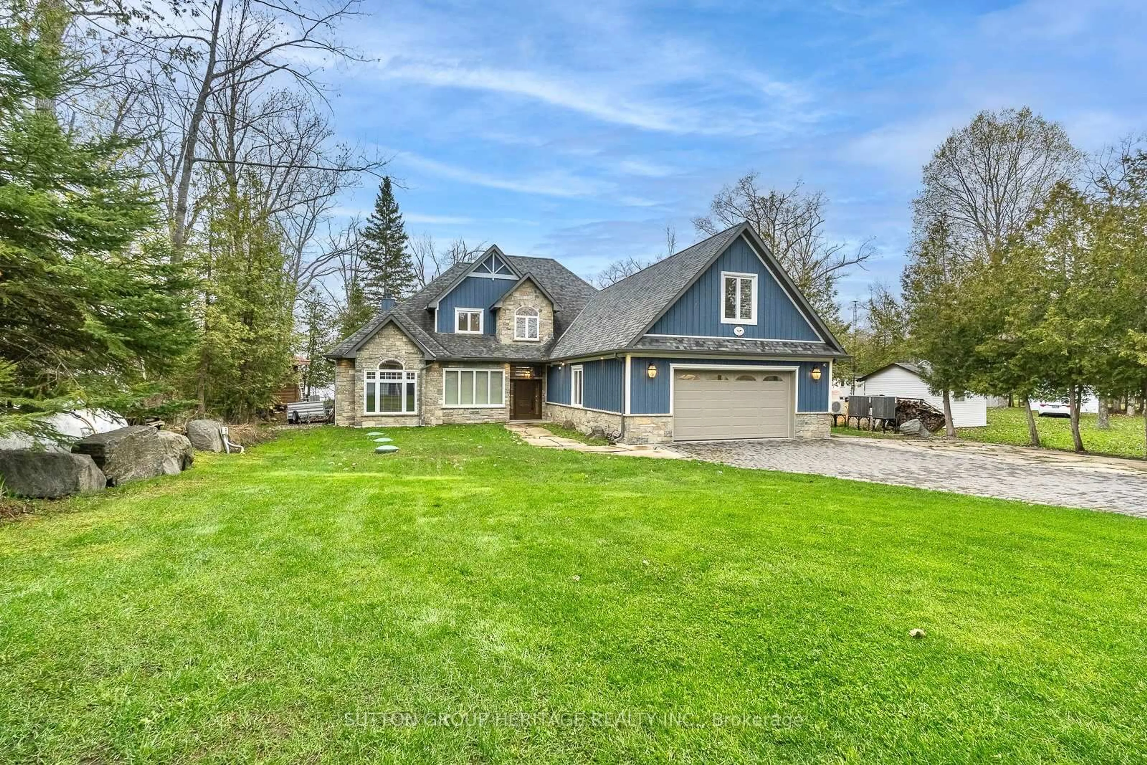 A pic from outside/outdoor area/front of a property/back of a property/a pic from drone, unknown for 58 Pirates Glen Dr, Trent Lakes Ontario K0M 1A0