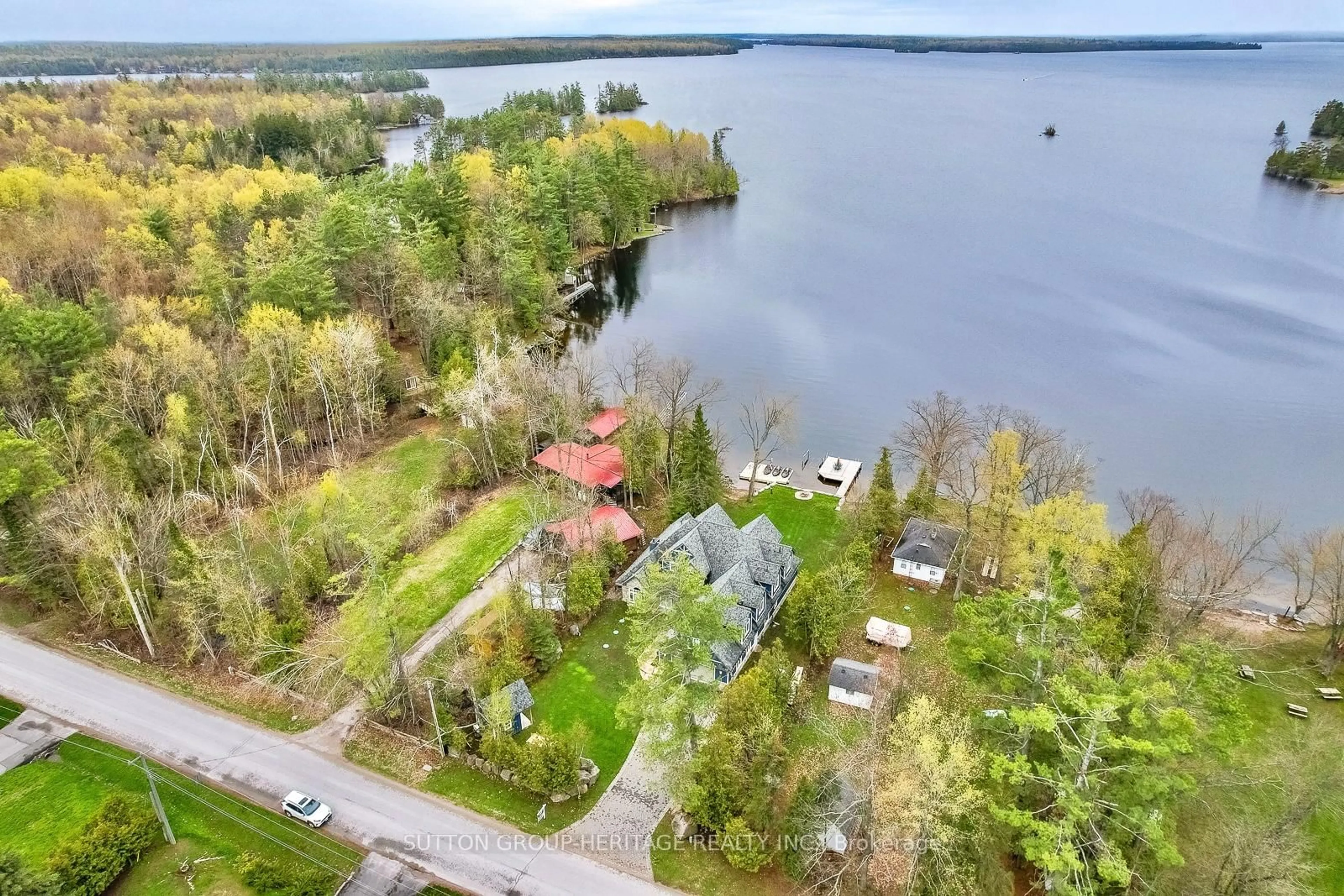 A pic from outside/outdoor area/front of a property/back of a property/a pic from drone, water/lake/river/ocean view for 58 Pirates Glen Dr, Trent Lakes Ontario K0M 1A0