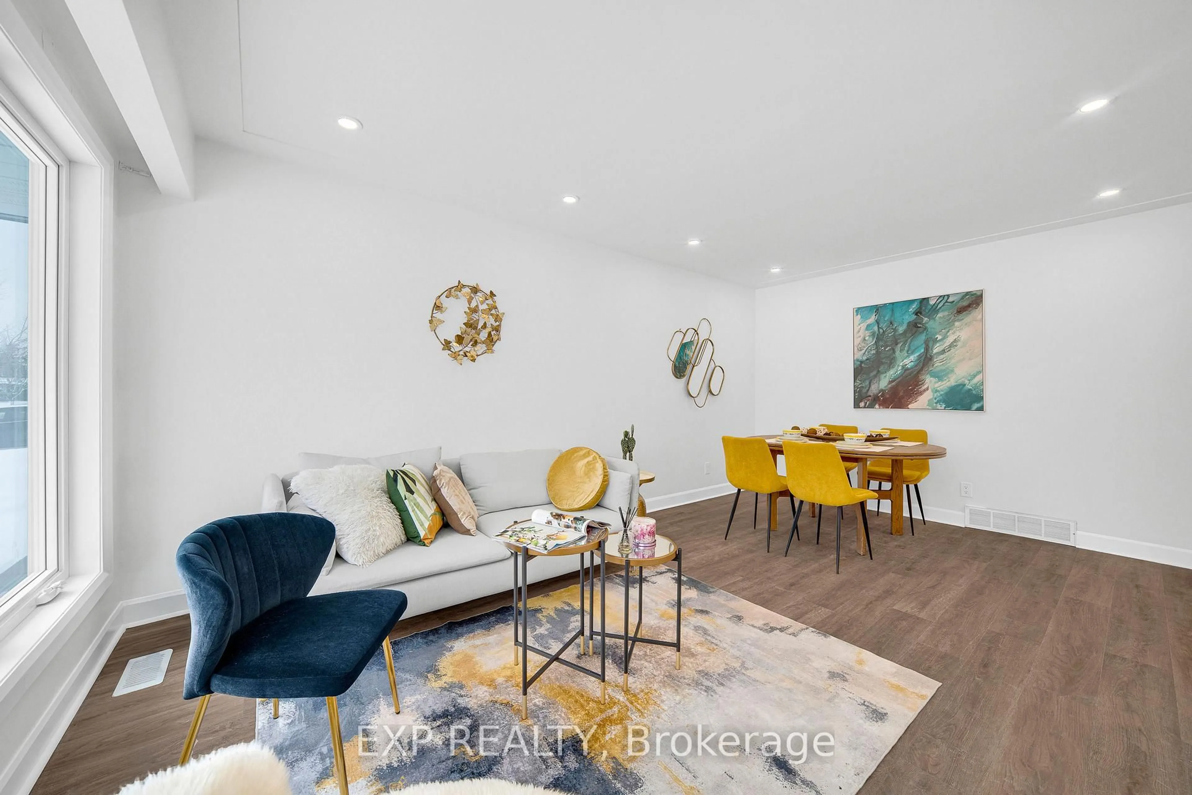 Living room with furniture, wood/laminate floor for 768 Pleasant Park Rd, Ottawa Ontario K1G 1Y7