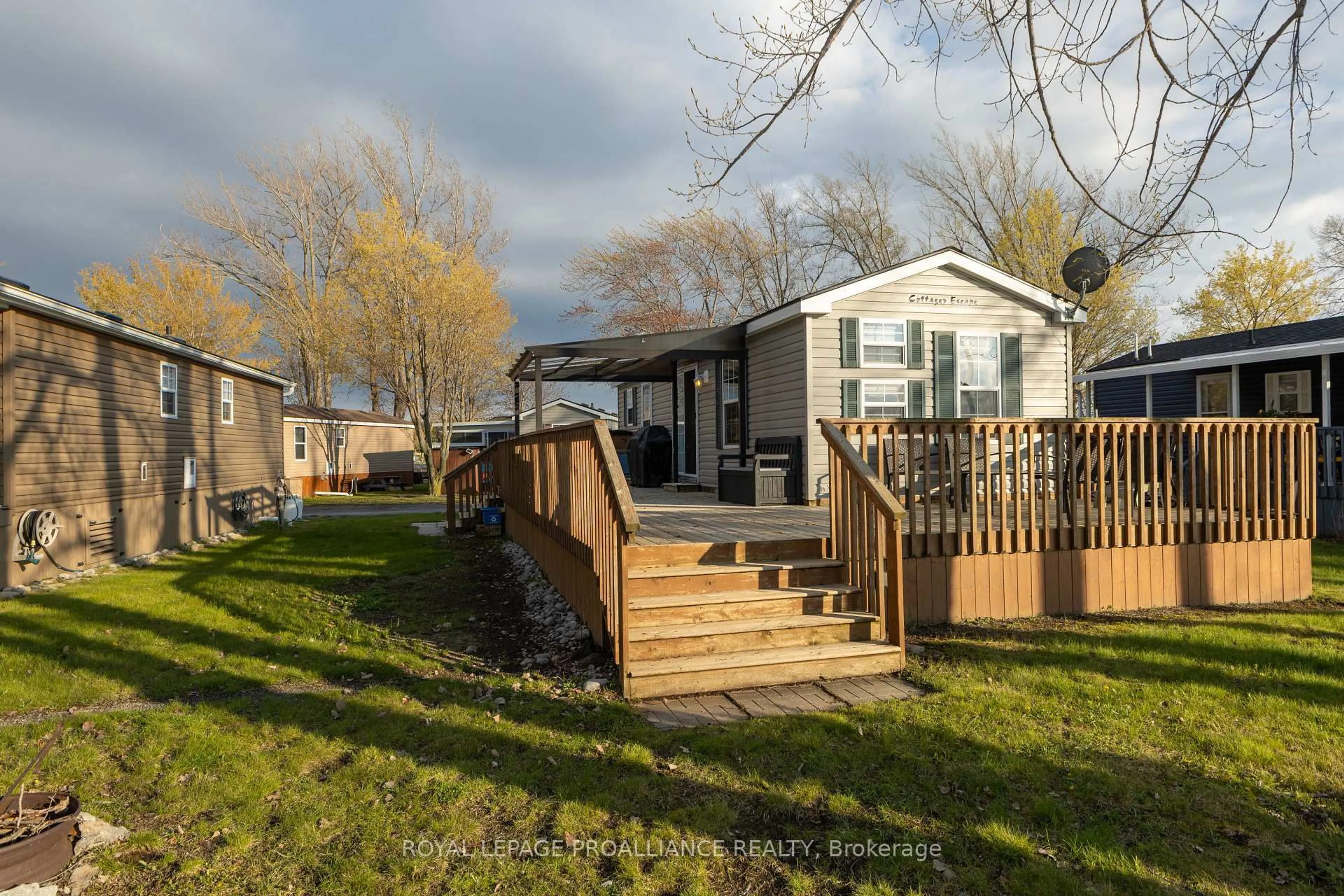A pic from outside/outdoor area/front of a property/back of a property/a pic from drone, street for 486 County Road 104 Cherry Beach Lane, Prince Edward County Ontario K0K 2T0