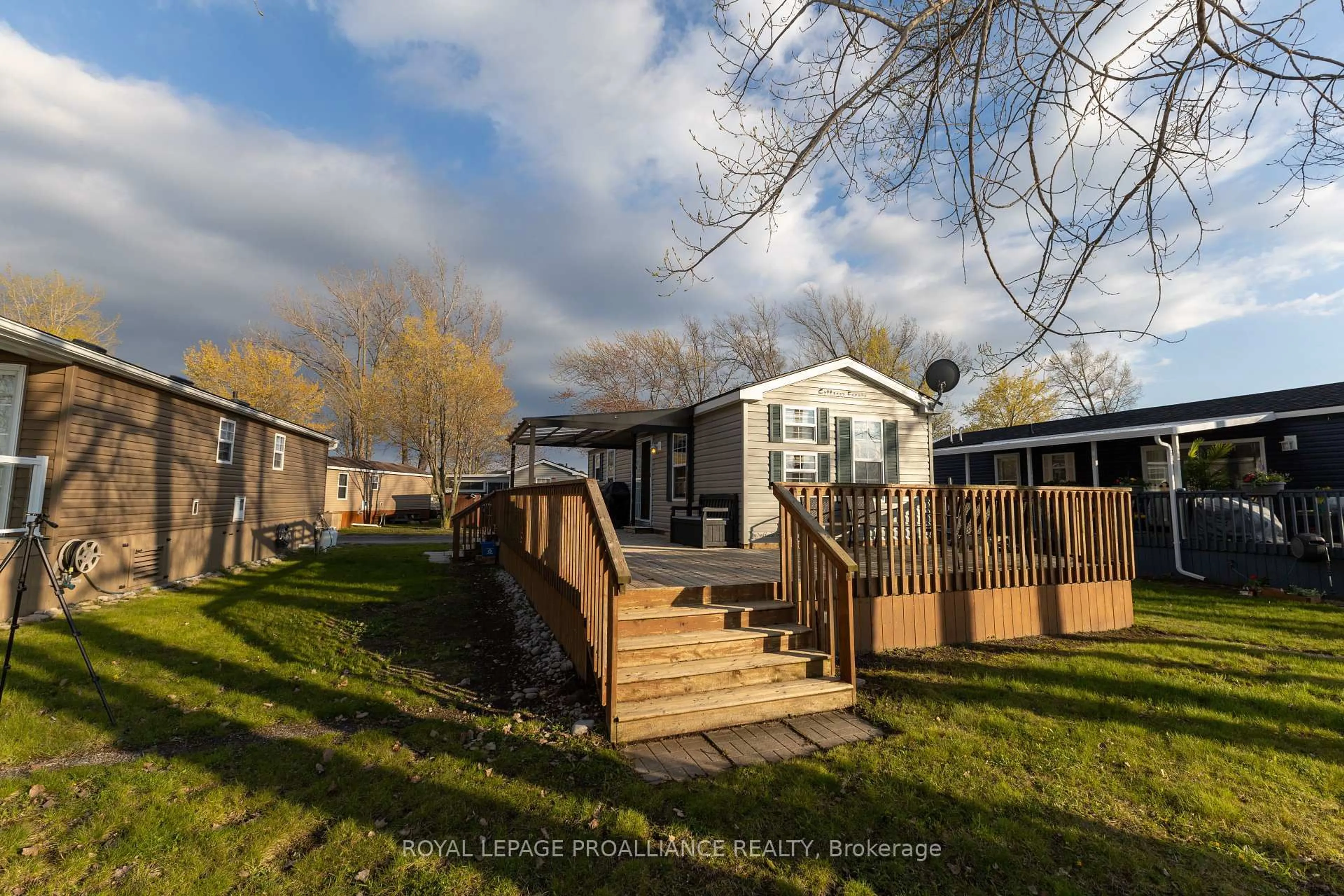 A pic from outside/outdoor area/front of a property/back of a property/a pic from drone, street for 486 County Road 104 Cherry Beach Lane, Prince Edward County Ontario K0K 2T0