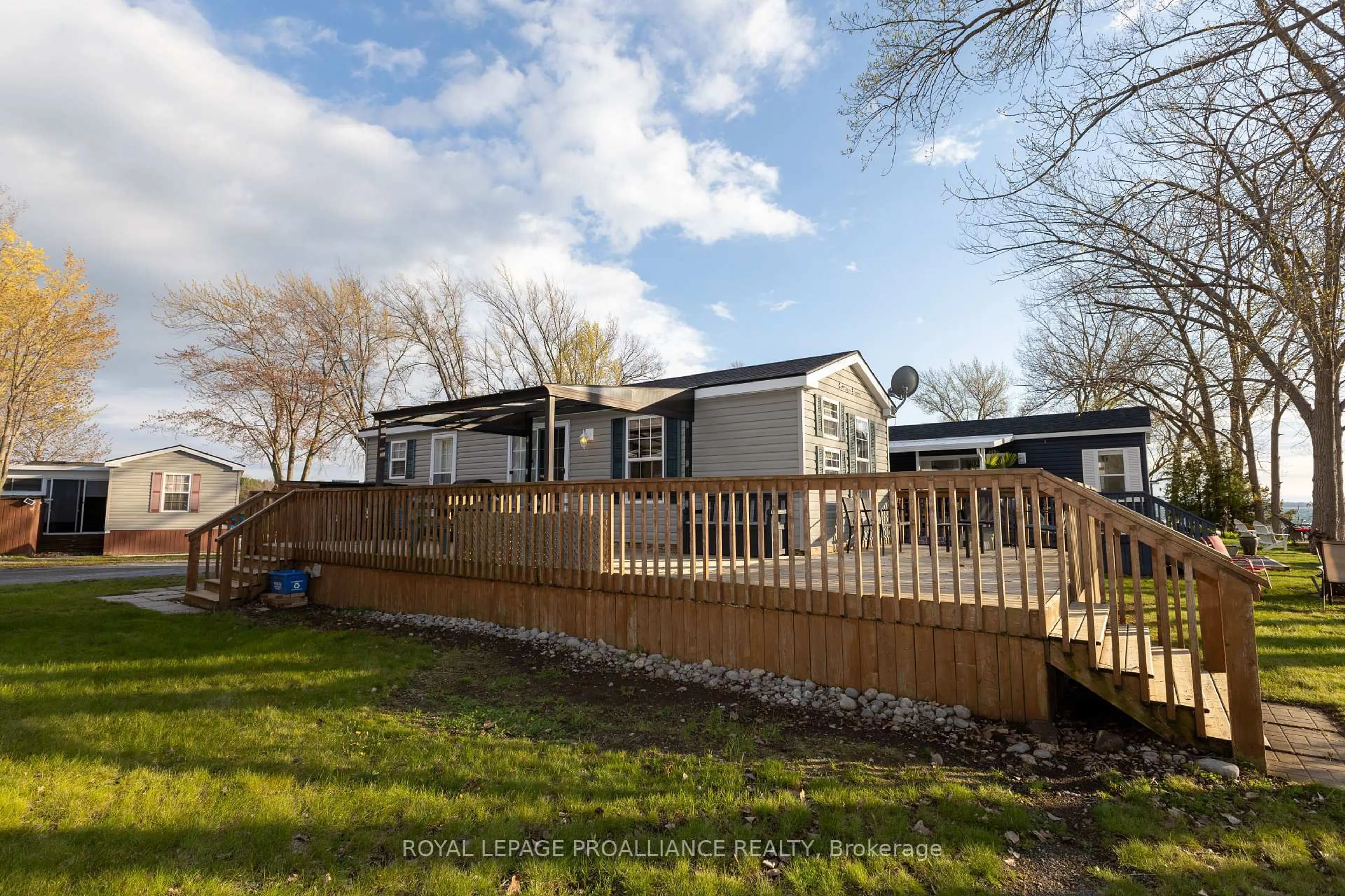 A pic from outside/outdoor area/front of a property/back of a property/a pic from drone, unknown for 486 County Road 104 Cherry Beach Lane, Prince Edward County Ontario K0K 2T0
