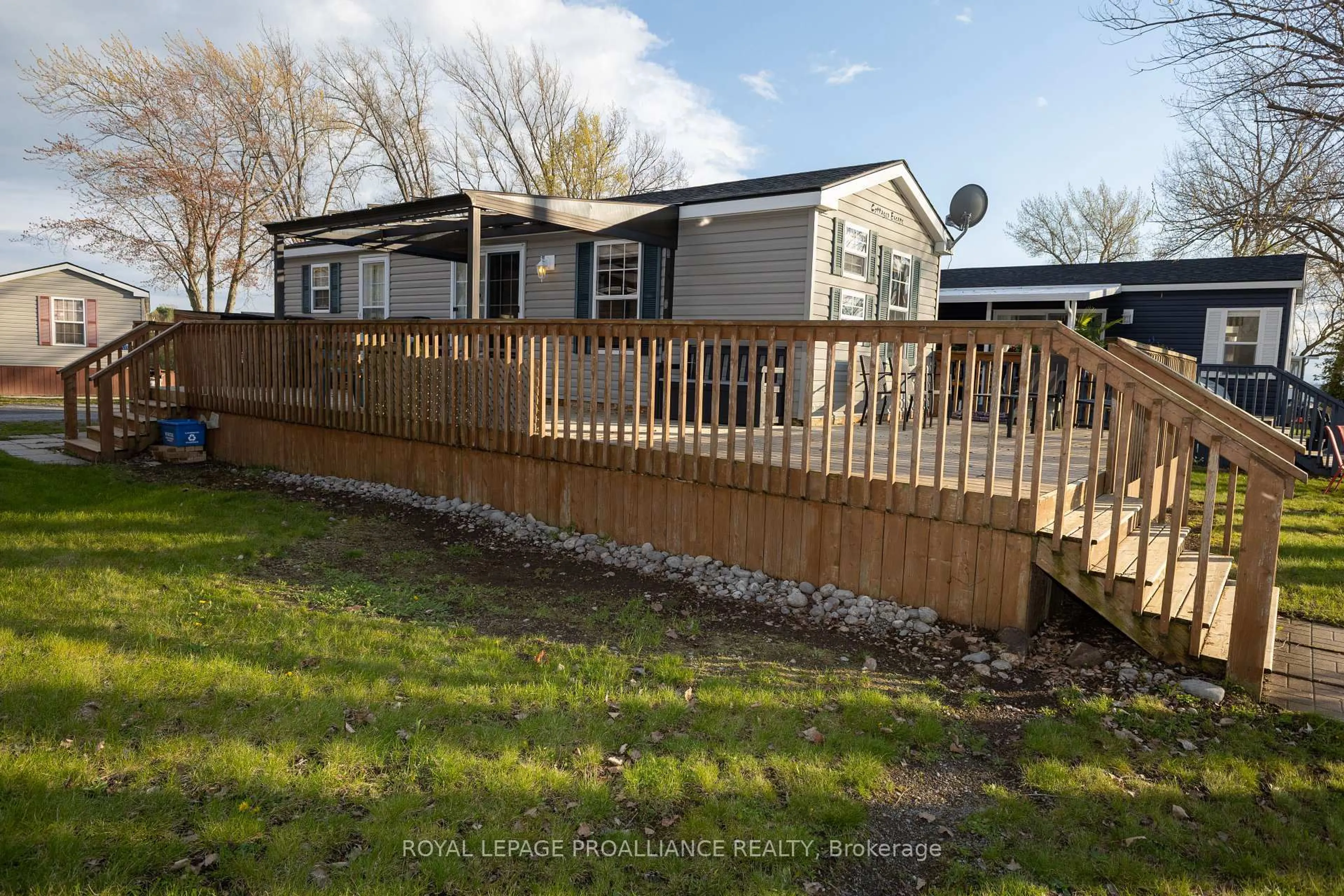 A pic from outside/outdoor area/front of a property/back of a property/a pic from drone, unknown for 486 County Road 104 Cherry Beach Lane, Prince Edward County Ontario K0K 2T0