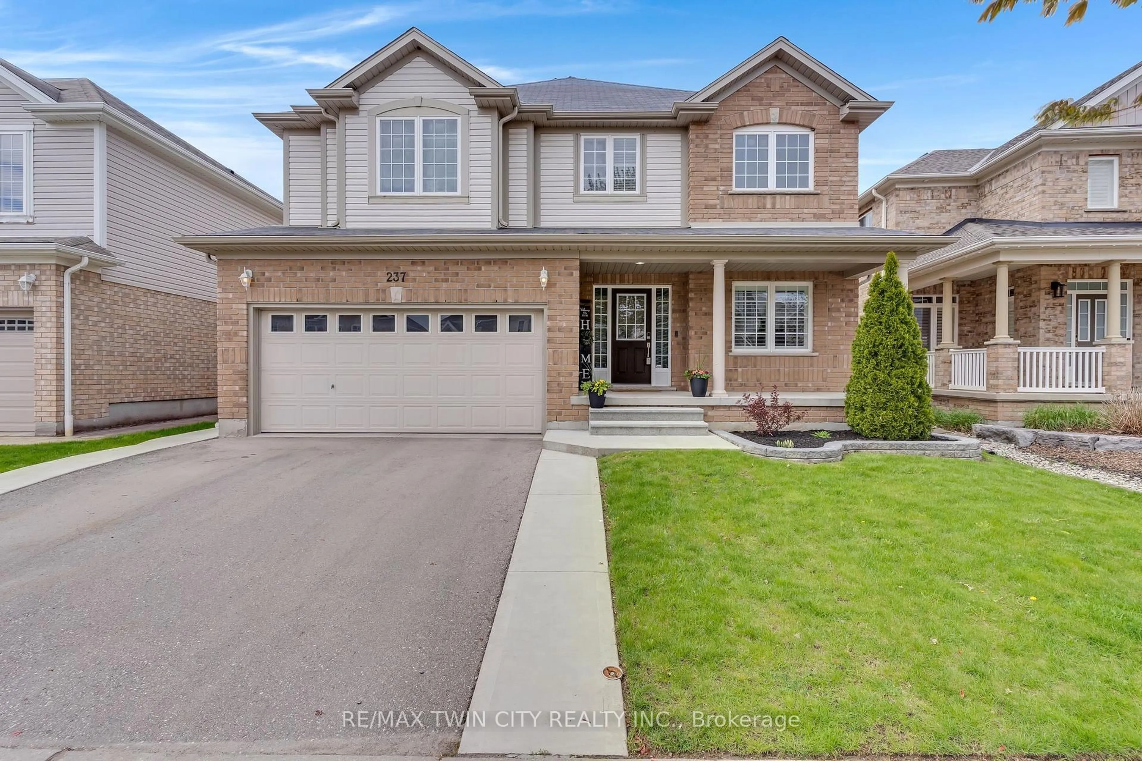 Home with brick exterior material, street for 237 Waterbend Cres, Kitchener Ontario N2A 4L3