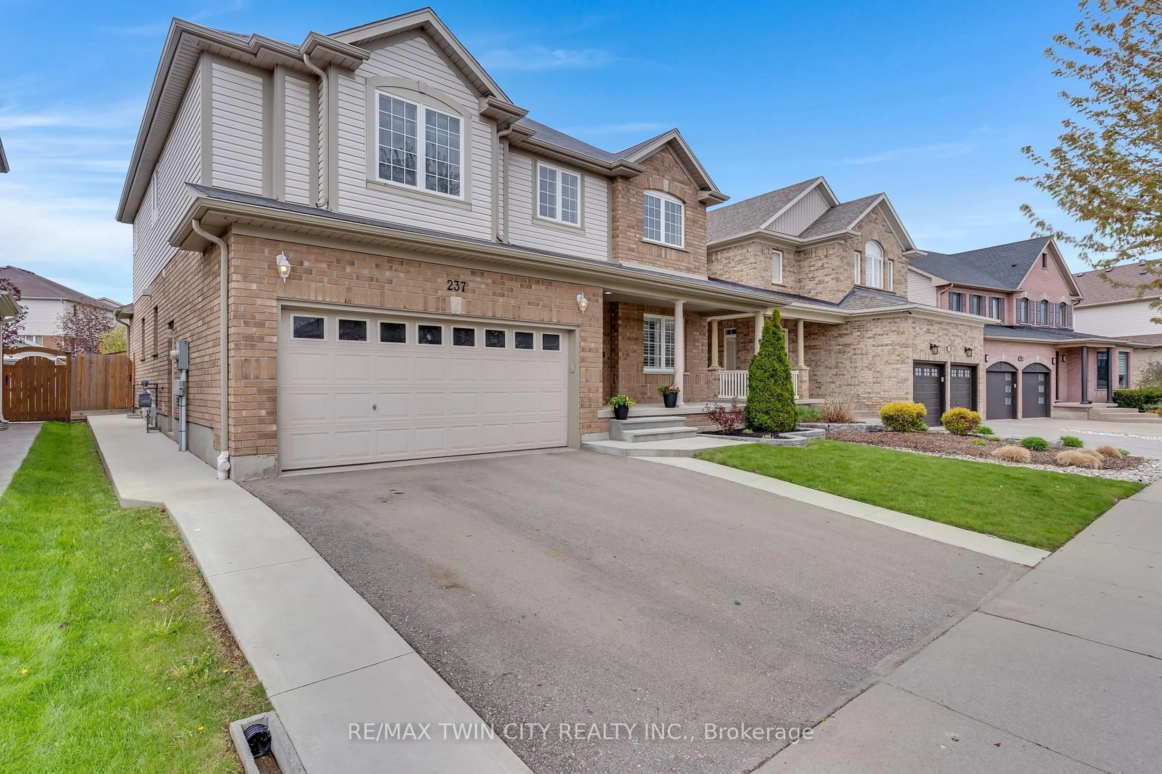 Home with brick exterior material, street for 237 Waterbend Cres, Kitchener Ontario N2A 4L3