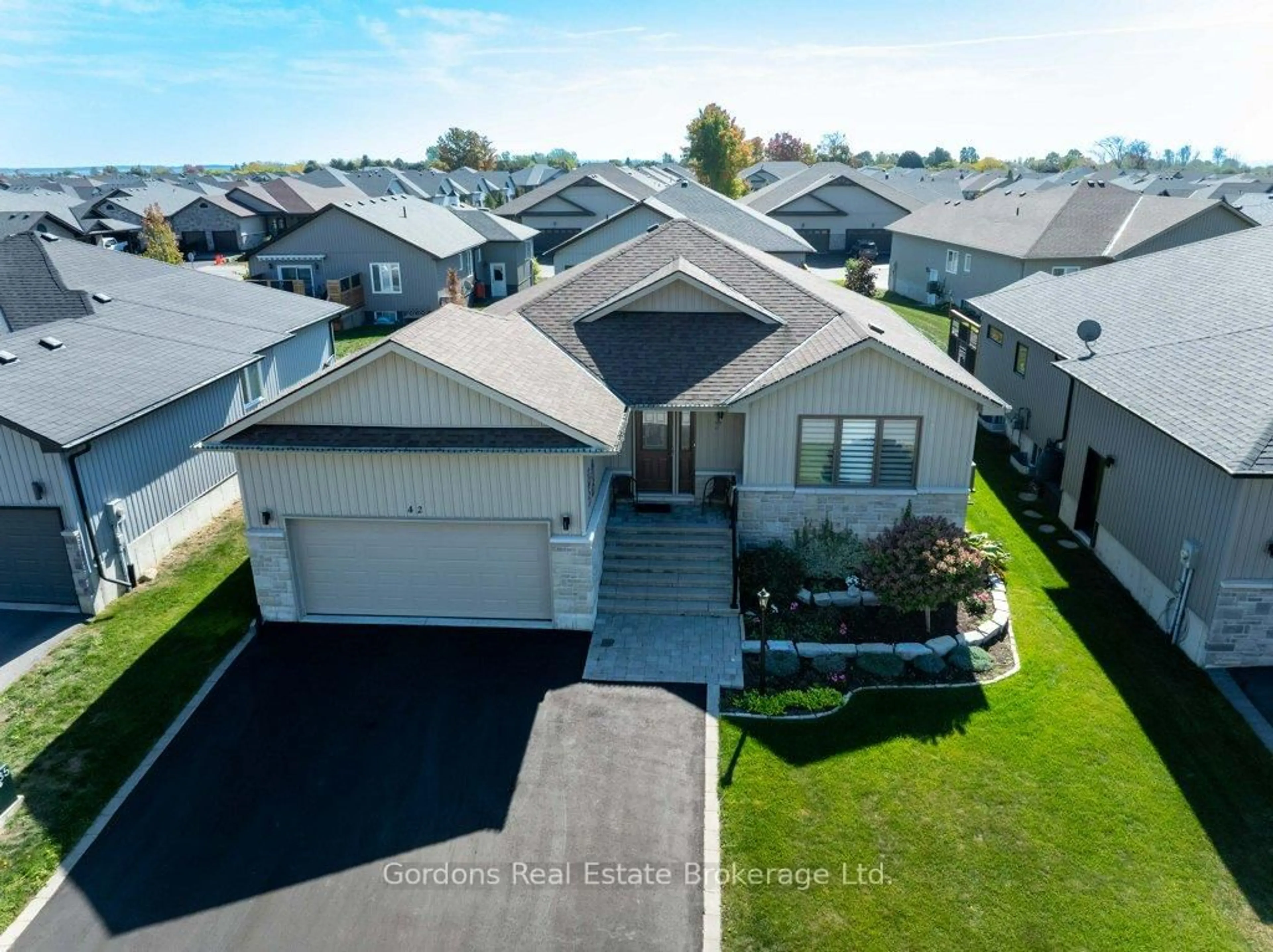 A pic from outside/outdoor area/front of a property/back of a property/a pic from drone, street for 42 Conger Dr, Prince Edward County Ontario K0K 3L0