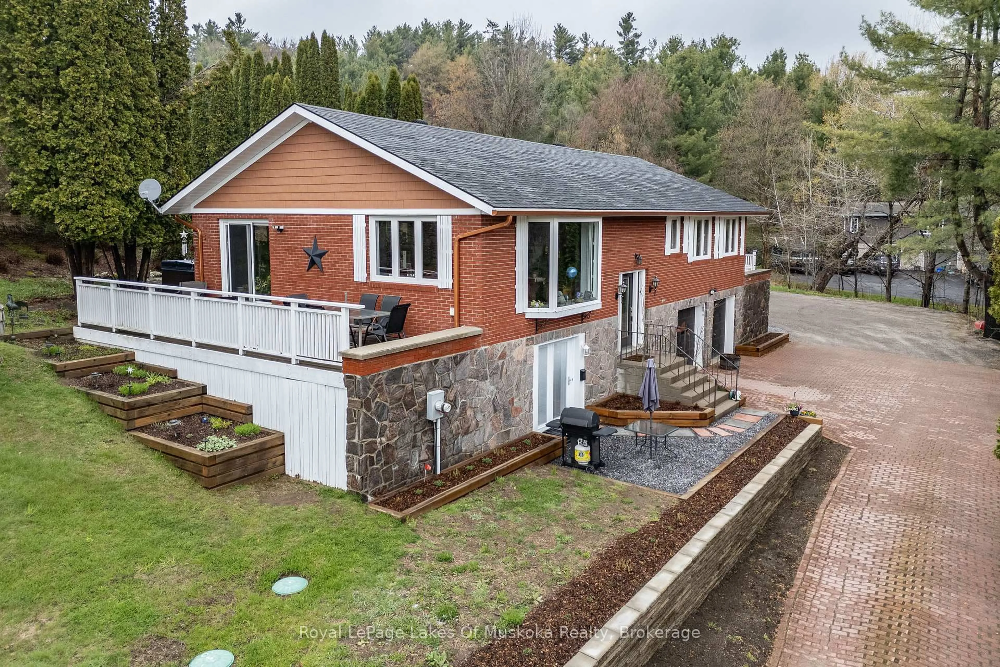A pic from outside/outdoor area/front of a property/back of a property/a pic from drone, unknown for 183 Santas Village Rd, Bracebridge Ontario P1L 1W8