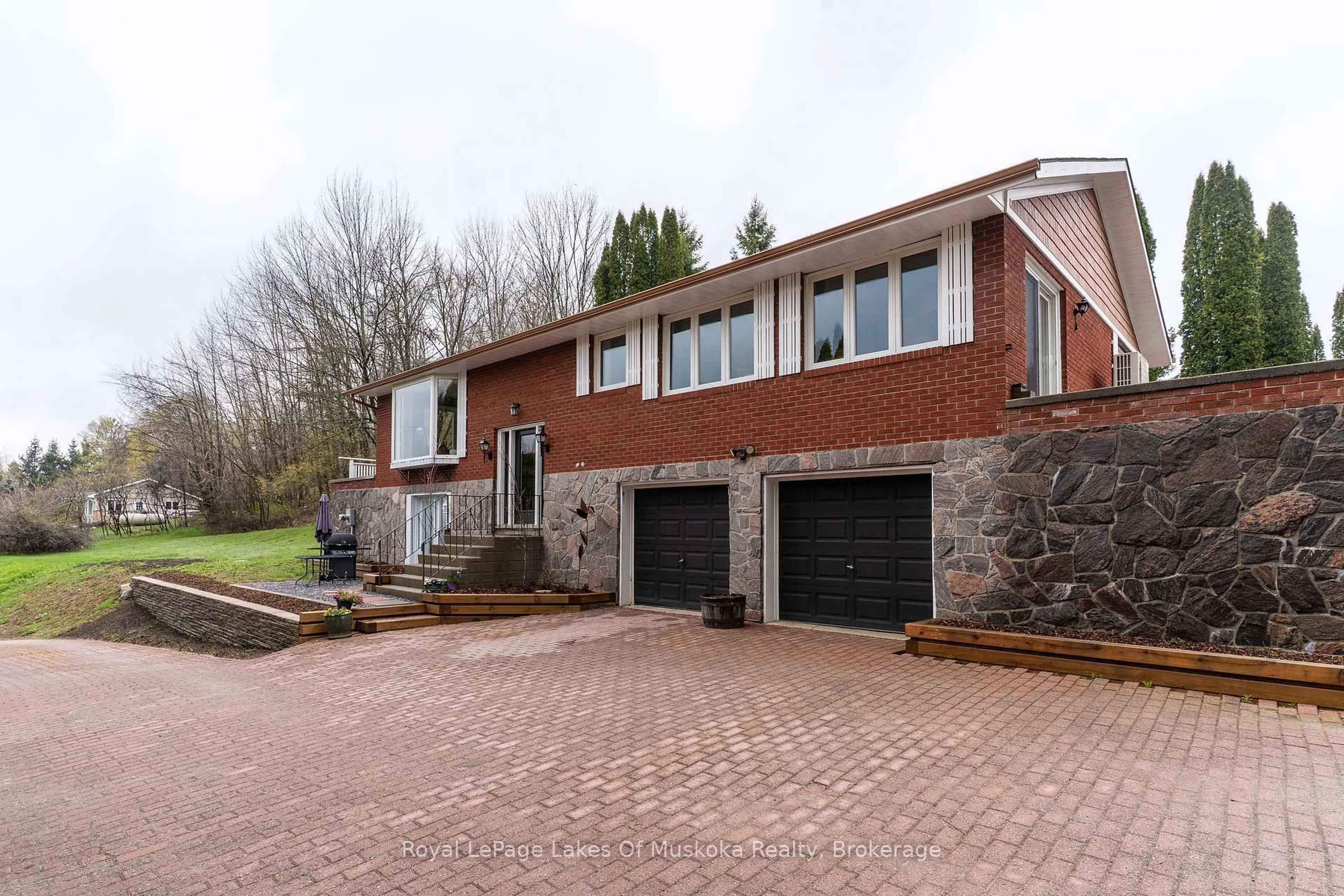 Home with brick exterior material, street for 183 Santas Village Rd, Bracebridge Ontario P1L 1W8