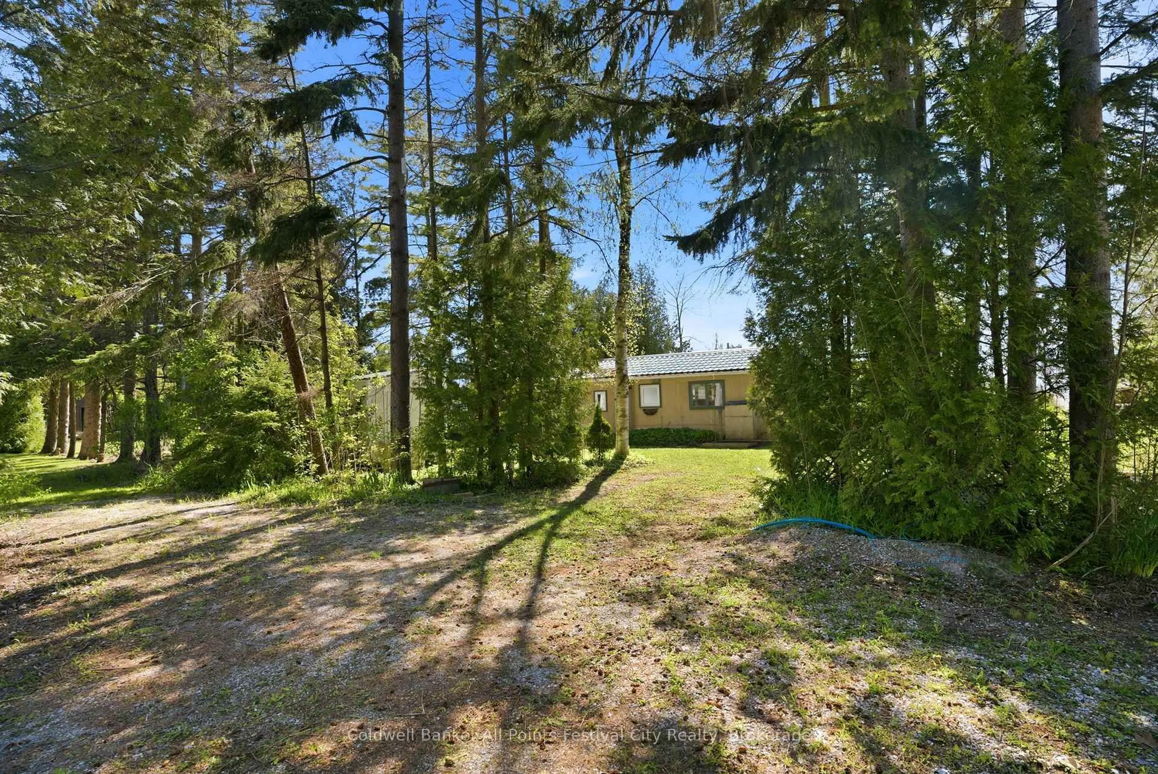 A pic from outside/outdoor area/front of a property/back of a property/a pic from drone, forest/trees view for 79257 Fuller Dr, Central Huron Ontario N7A 3X8
