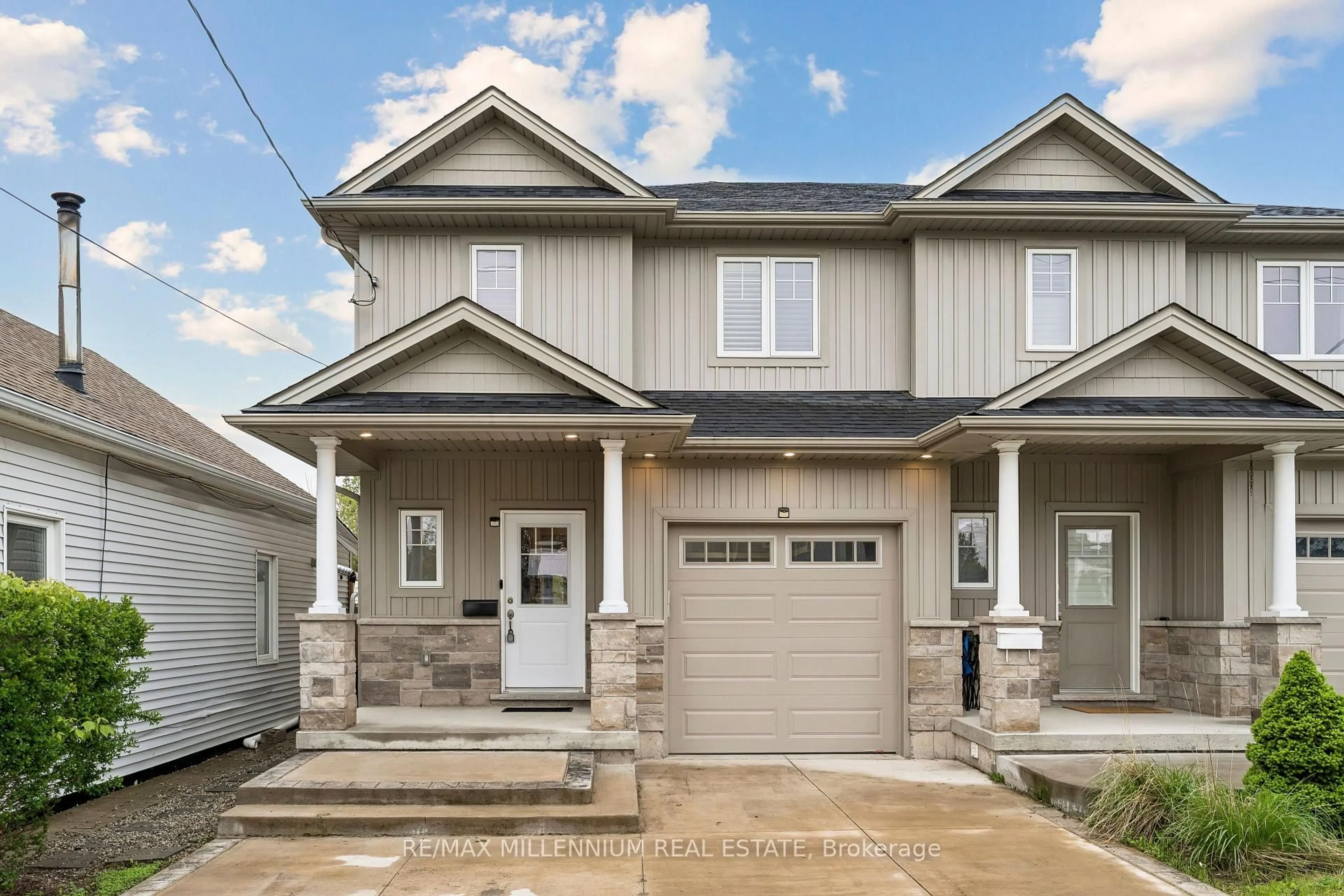 Home with vinyl exterior material, street for 24B Greenwood Ave, St. Catharines Ontario L2P 1X6