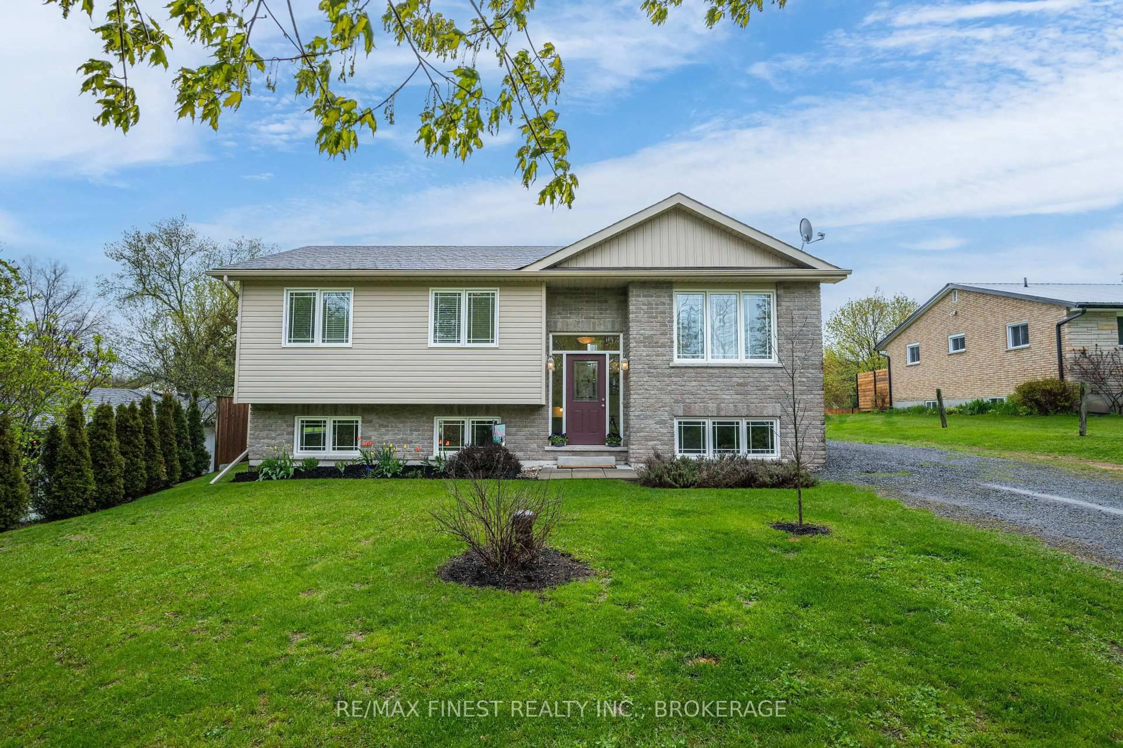 Home with vinyl exterior material, street for 145 Upper Lake St, Prince Edward County Ontario K0K 2T0
