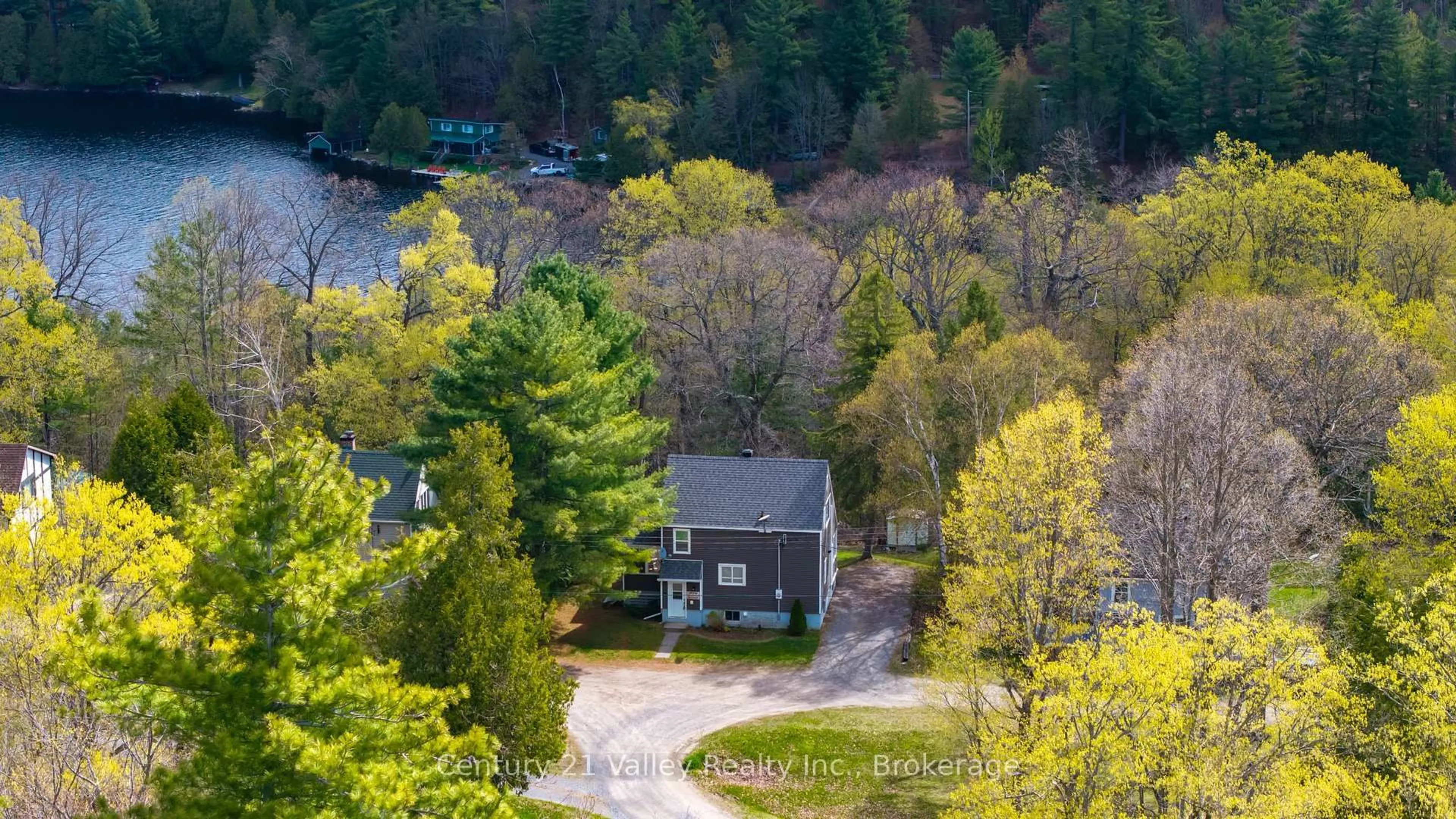 A pic from outside/outdoor area/front of a property/back of a property/a pic from drone, water/lake/river/ocean view for 36 Colony Lane, Calabogie Ontario K0J 1H0