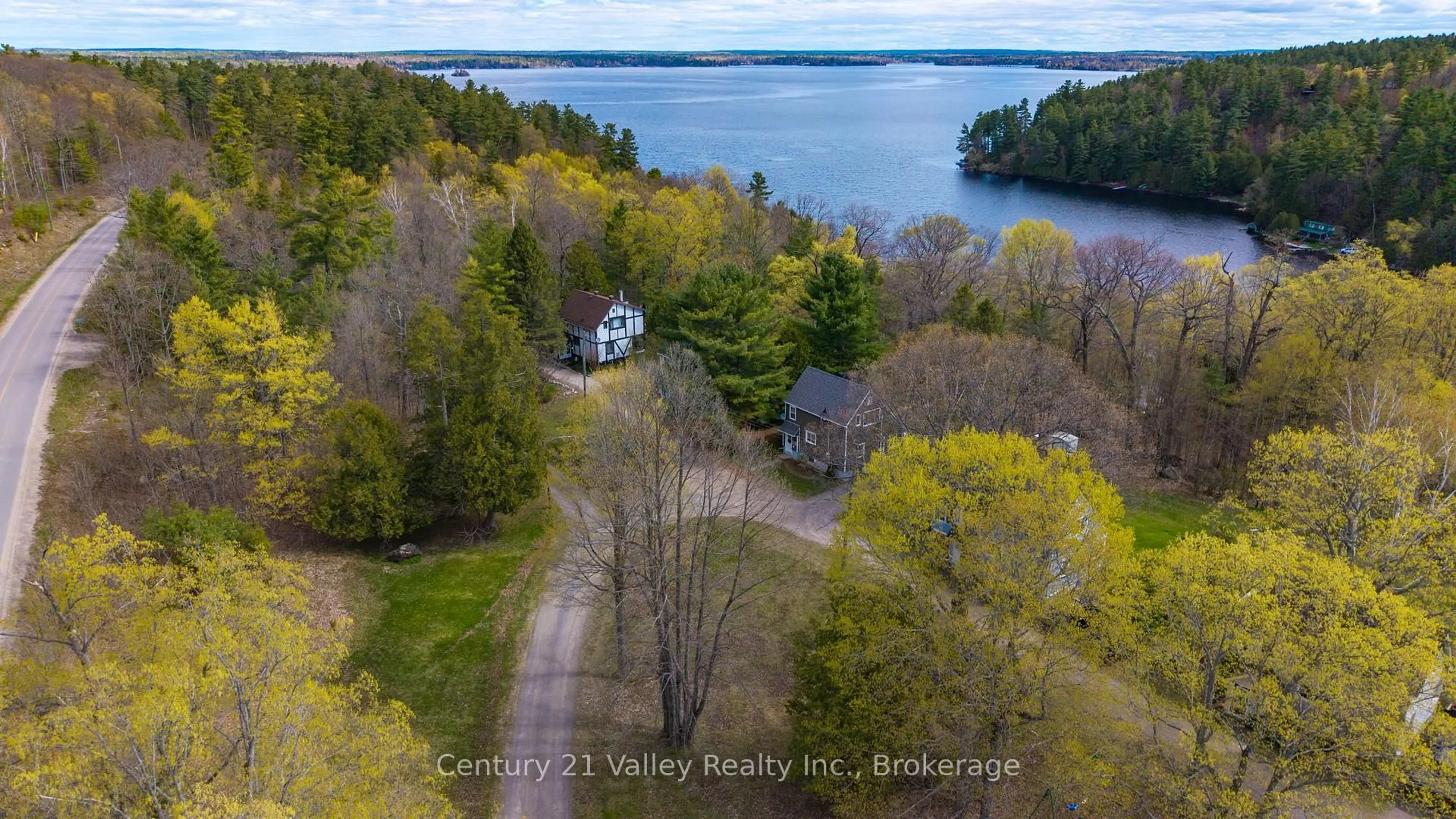 A pic from outside/outdoor area/front of a property/back of a property/a pic from drone, water/lake/river/ocean view for 36 Colony Lane, Calabogie Ontario K0J 1H0