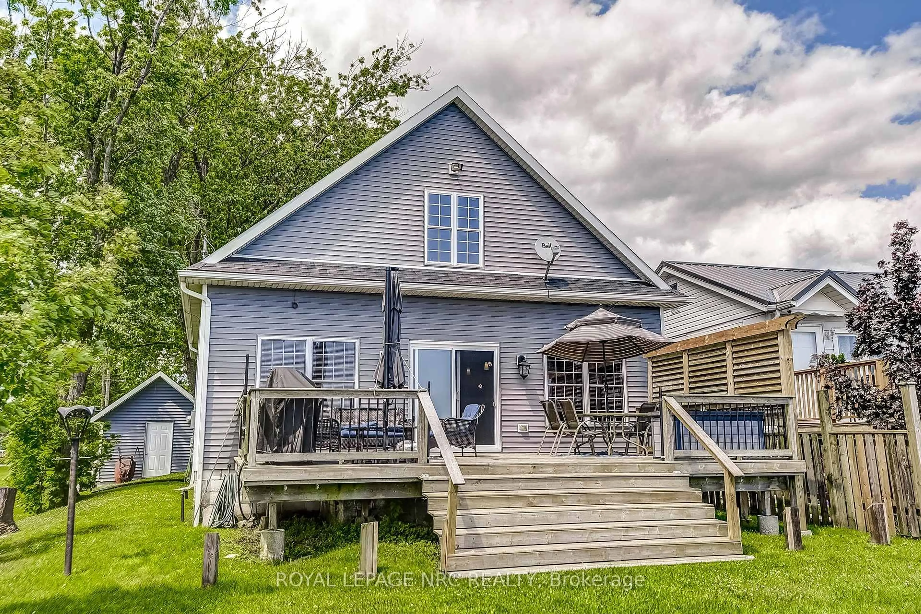 Home with vinyl exterior material, street for 10849 Lakeshore Rd, Wainfleet Ontario L3K 5V4