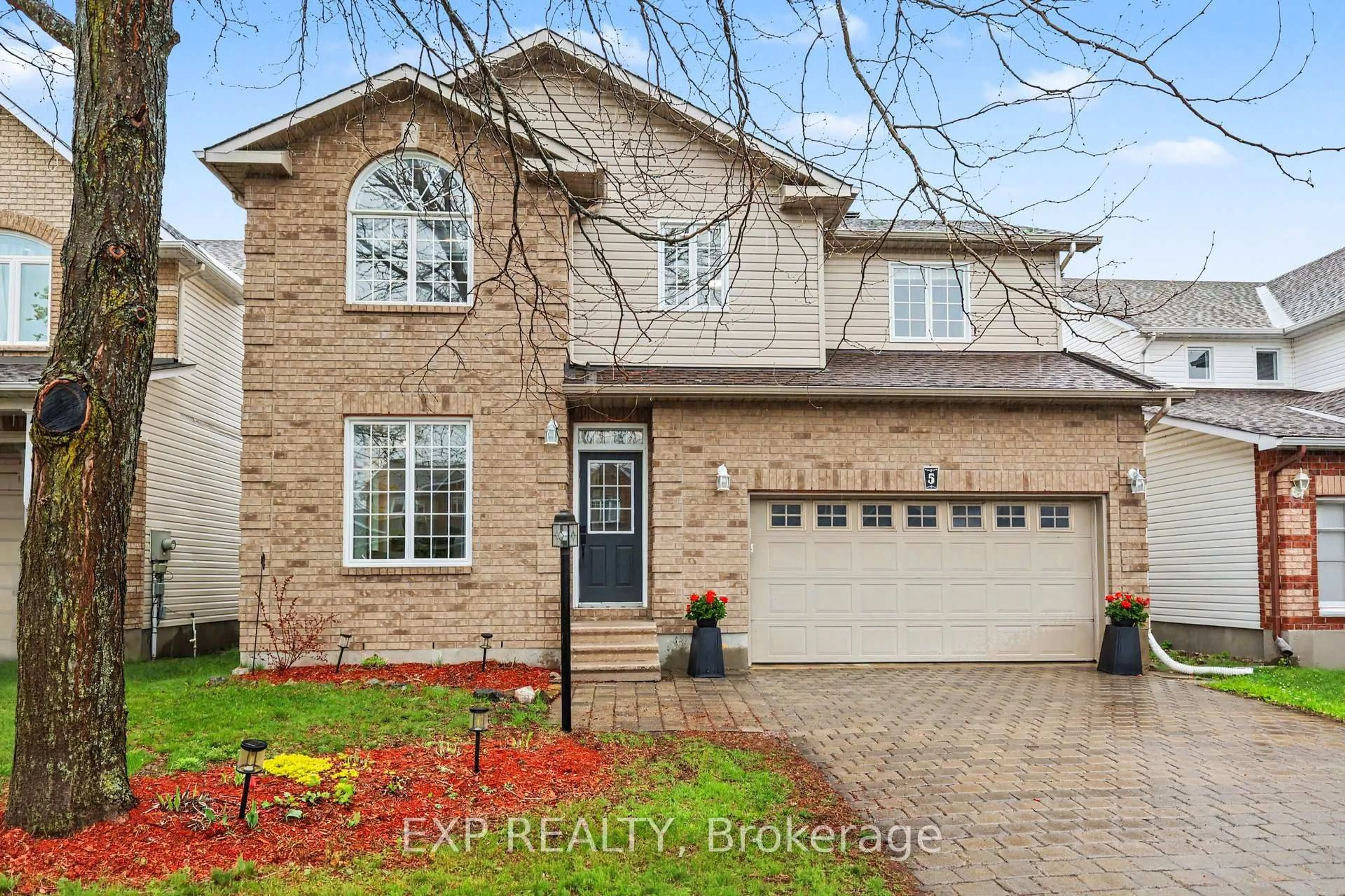 Home with brick exterior material, street for 5 Sundew Crt, Stittsville Ontario K2S 1Z5