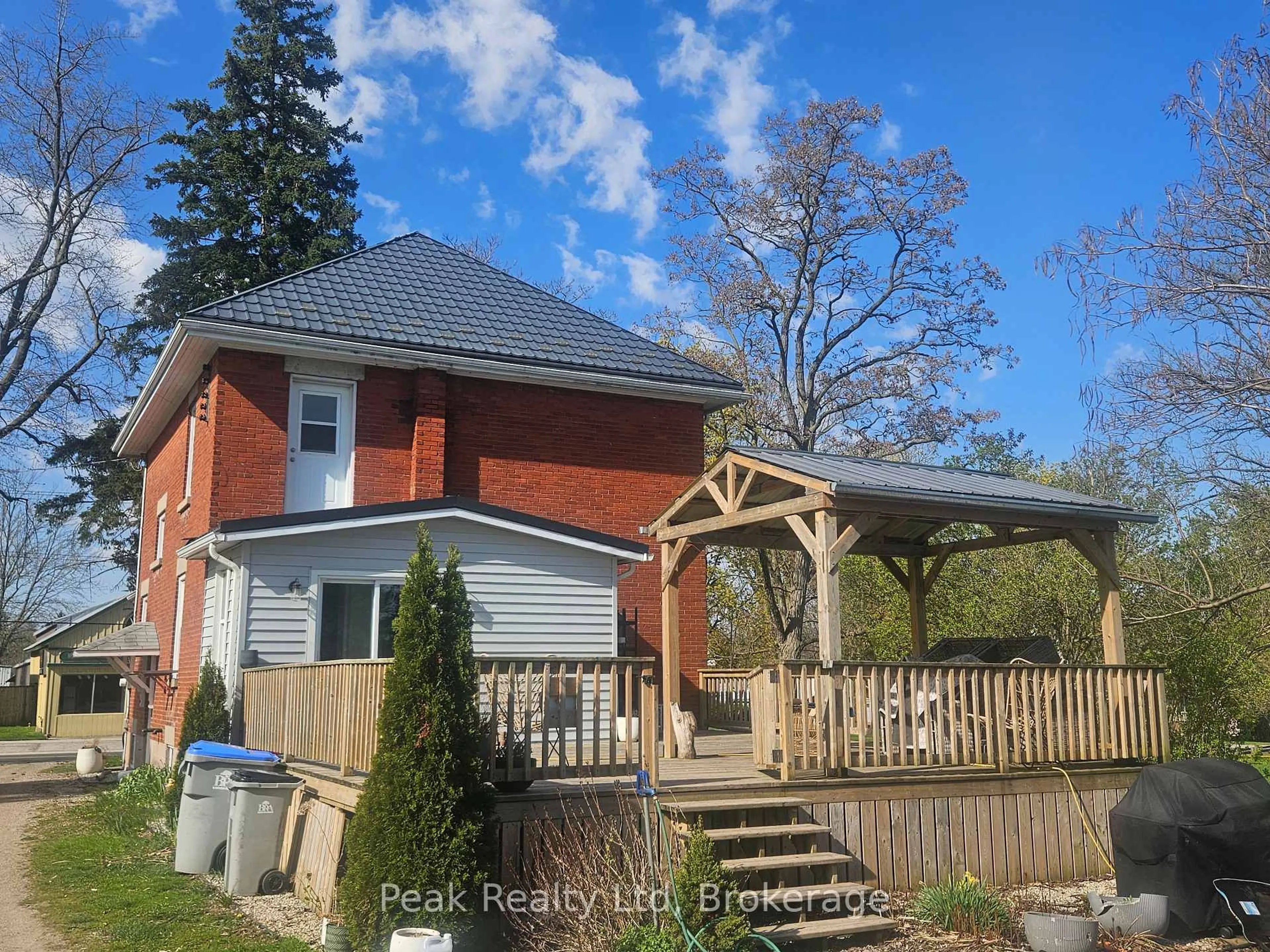 A pic from outside/outdoor area/front of a property/back of a property/a pic from drone, street for 236 Huron Rd, Perth South Ontario N0K 1X0