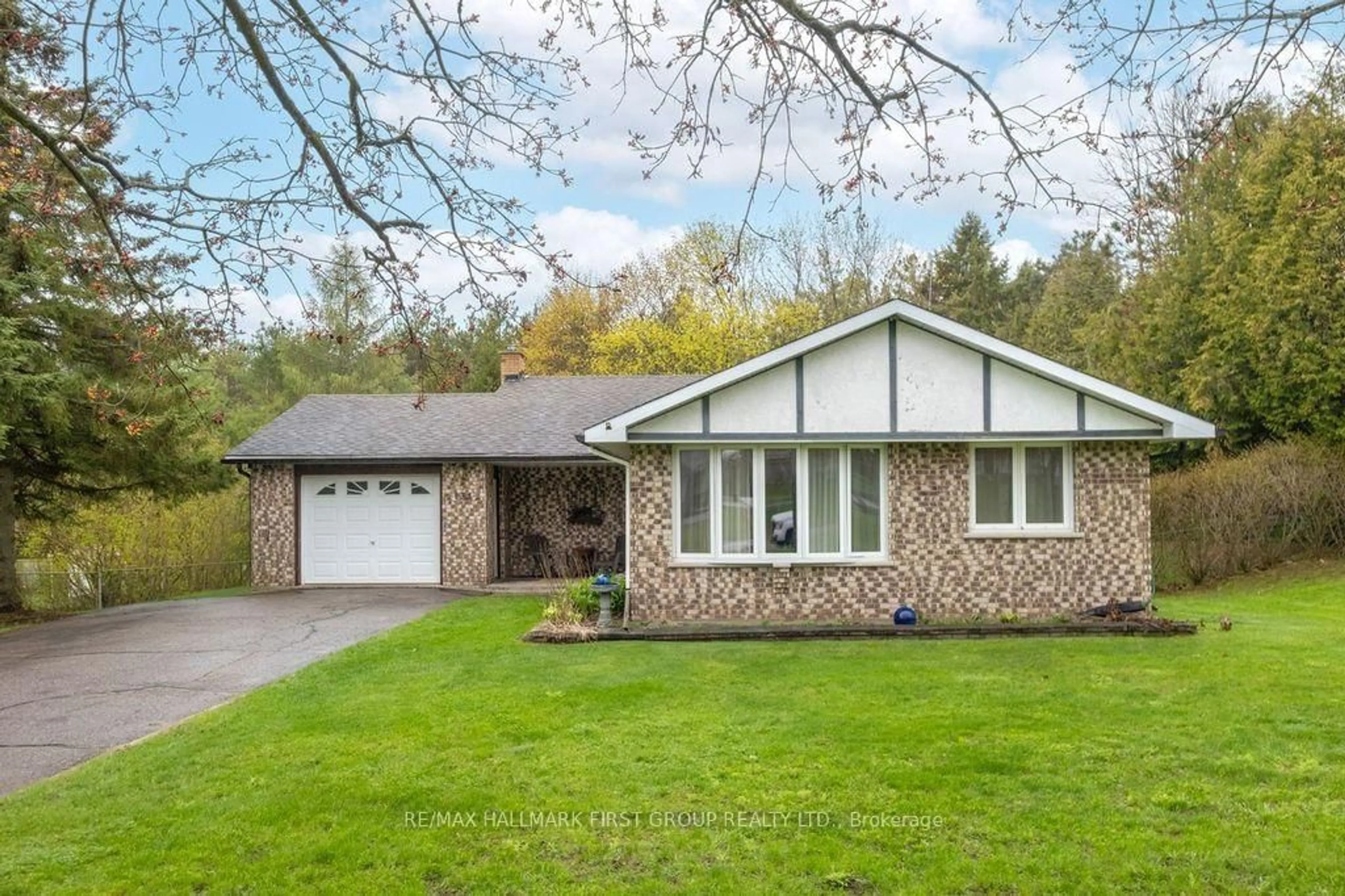 Home with vinyl exterior material, street for 131 Corbett Dr, Kawartha Lakes Ontario L0A 1K0