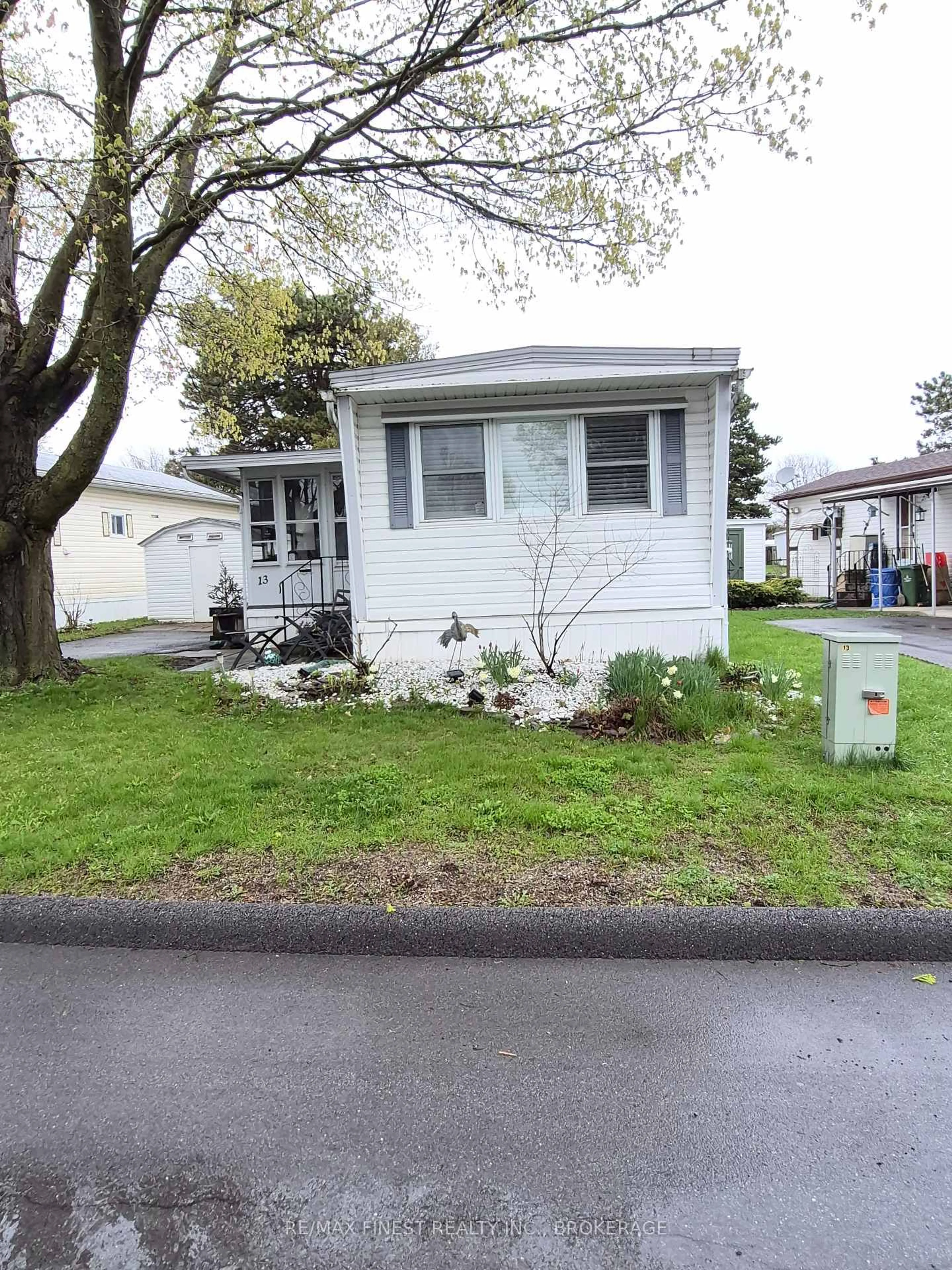 Home with vinyl exterior material, street for 13 Wentworth Dr, Kingston Ontario K7K 5E1