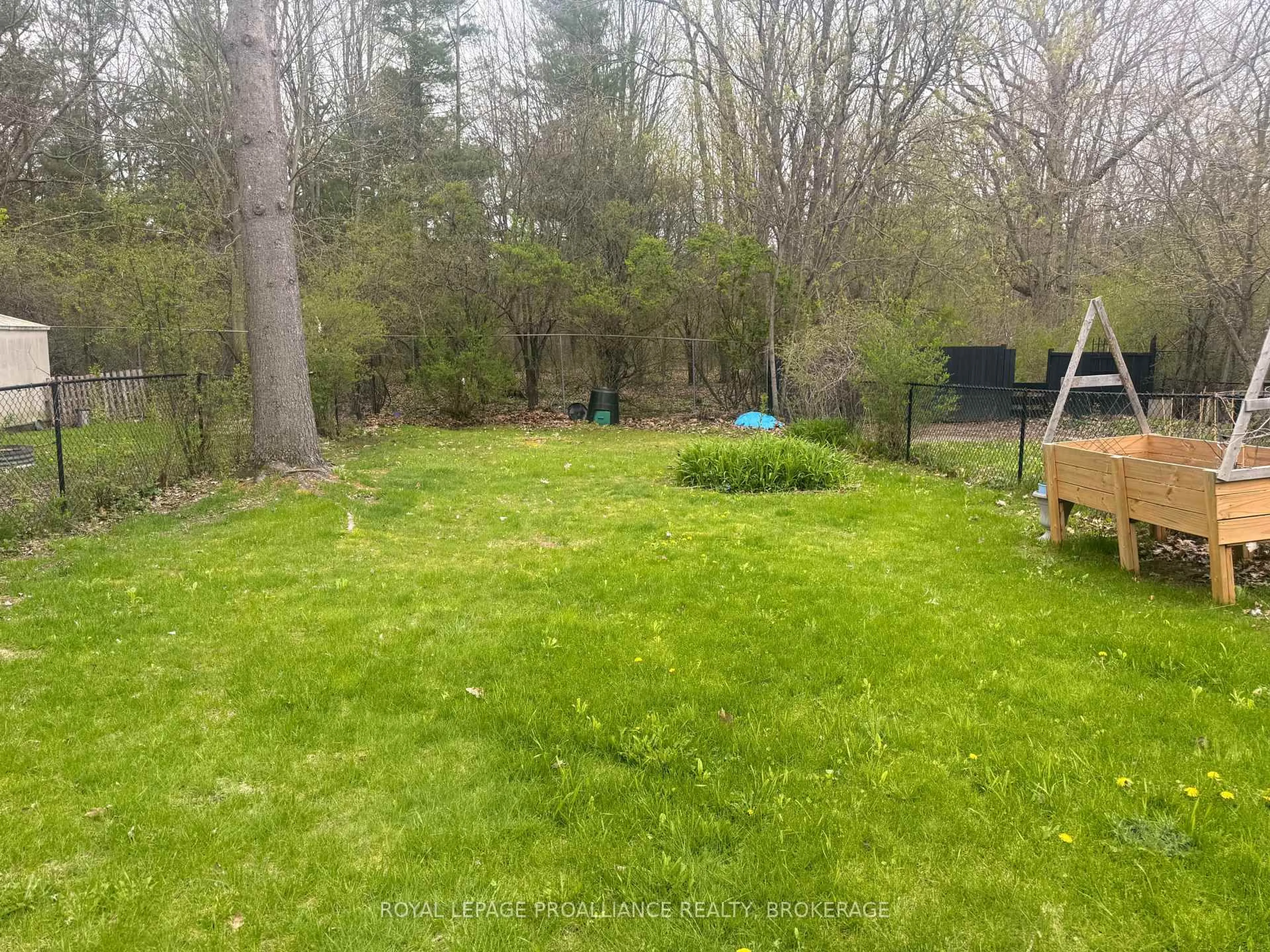 A pic from outside/outdoor area/front of a property/back of a property/a pic from drone, forest/trees view for 614 Barnsley Cres, Kingston Ontario K7M 8X4