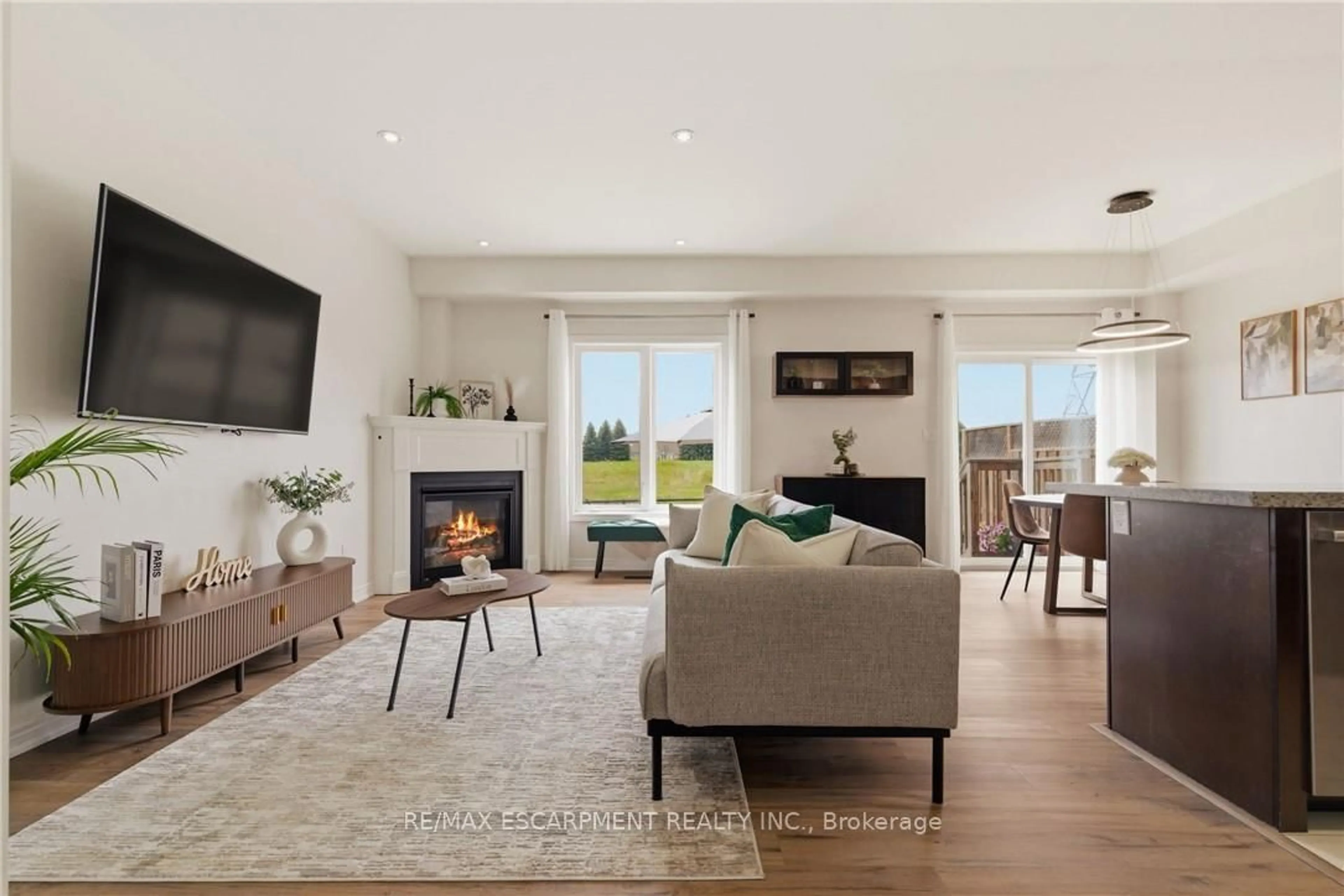 Living room with furniture, unknown for 73 Medici Lane #5, Hamilton Ontario L9B 0H3