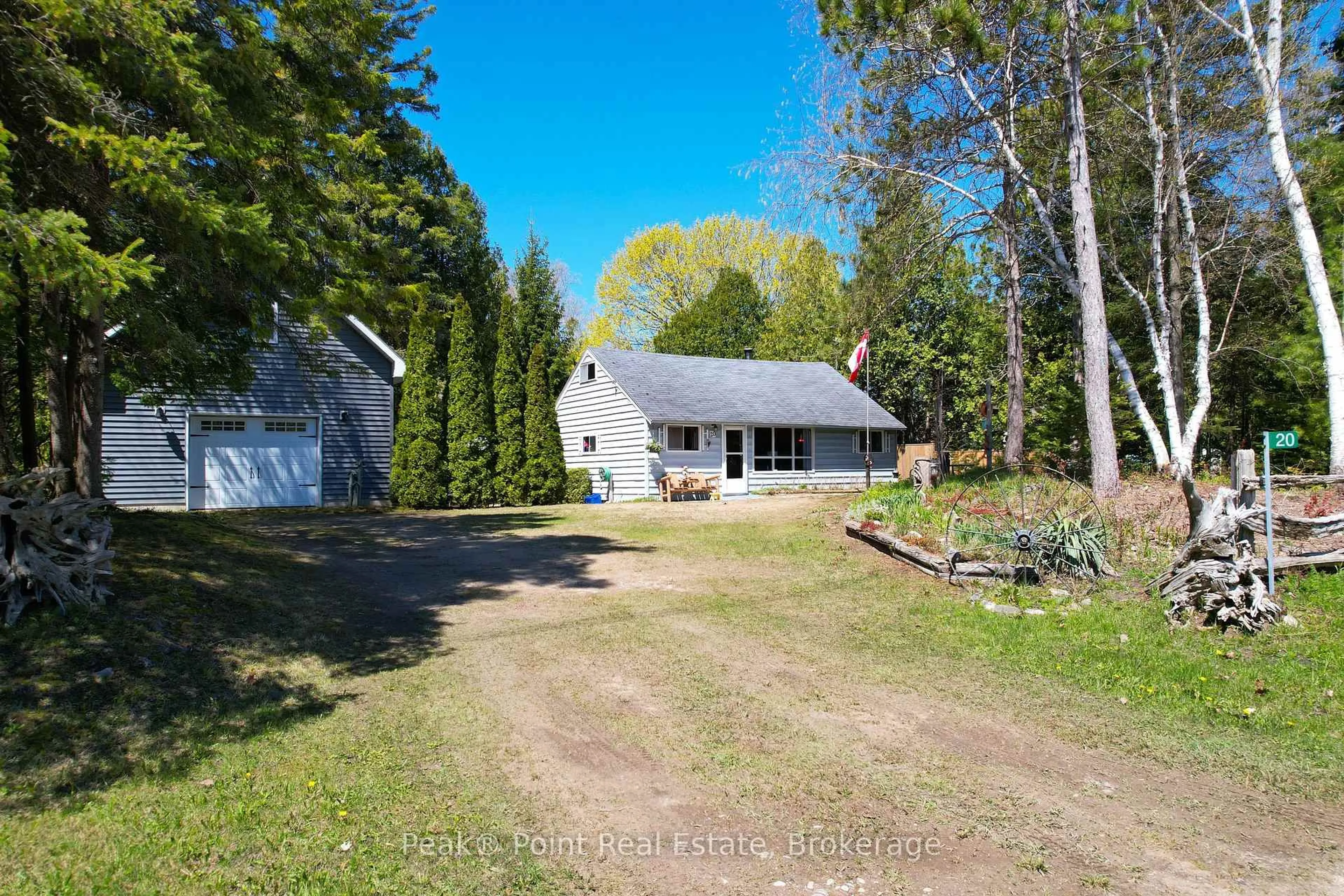A pic from outside/outdoor area/front of a property/back of a property/a pic from drone, unknown for 20 Clarence Ave, South Bruce Peninsula Ontario N0H 2G0