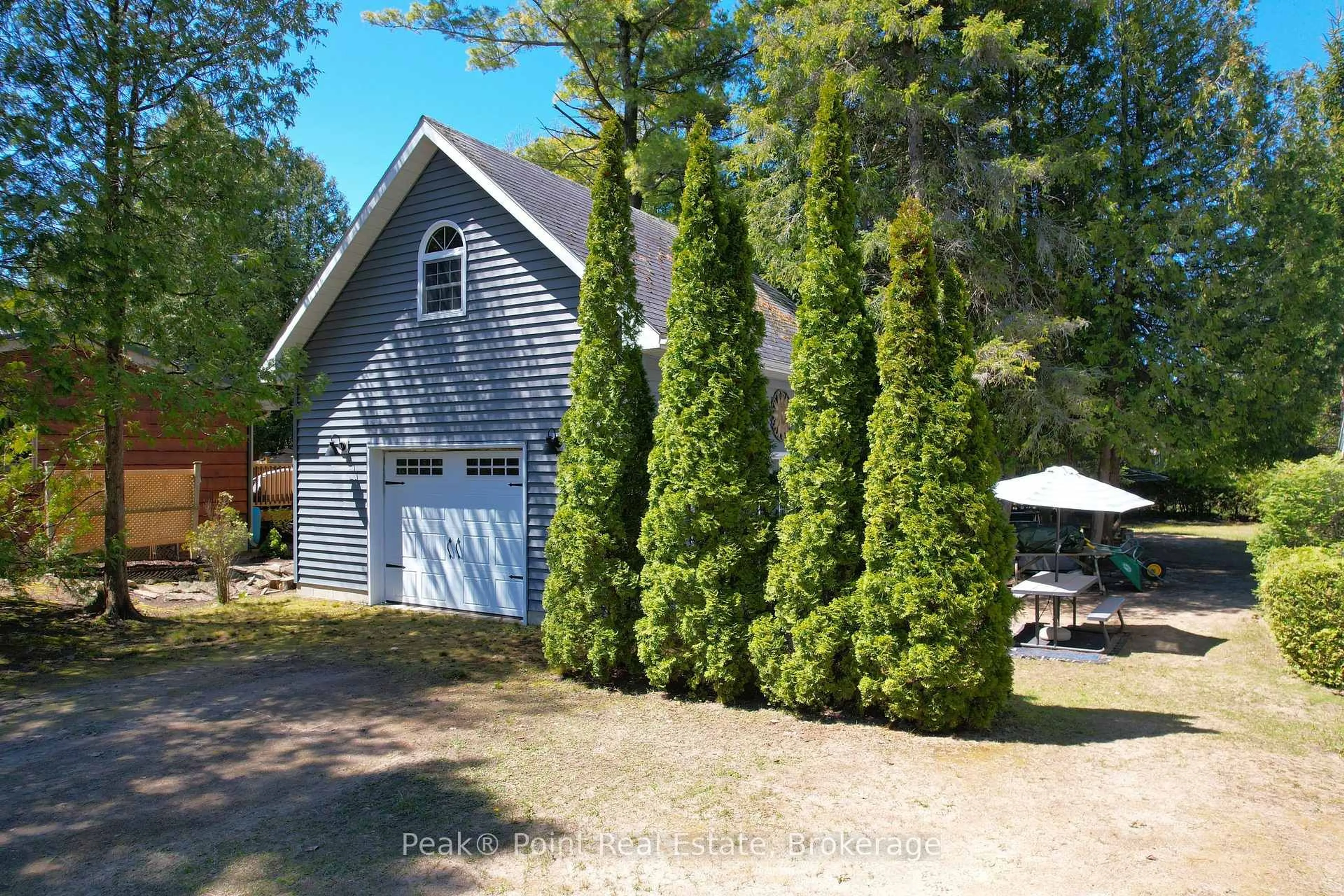 A pic from outside/outdoor area/front of a property/back of a property/a pic from drone, street for 20 Clarence Ave, South Bruce Peninsula Ontario N0H 2G0