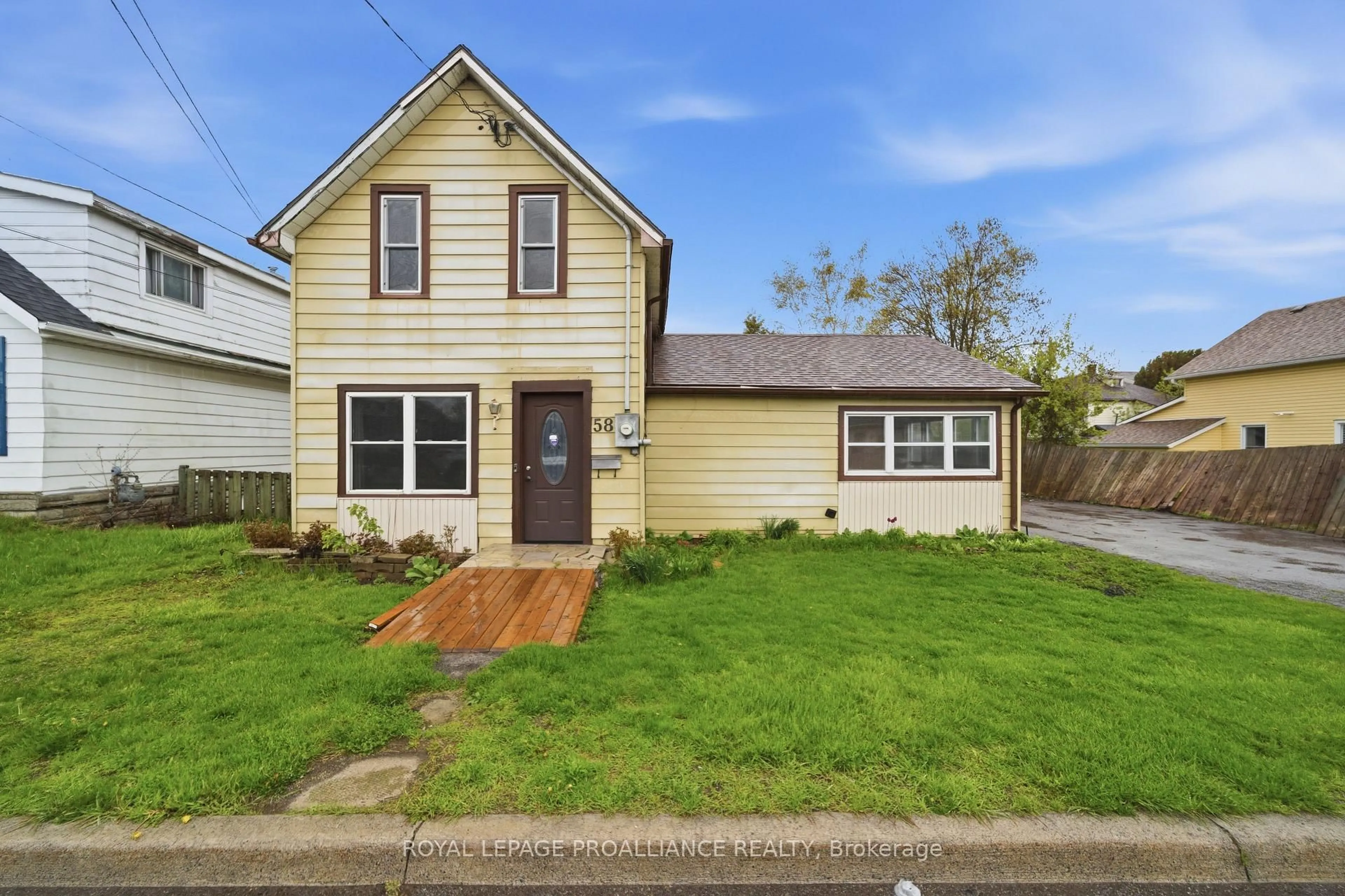 Home with vinyl exterior material, street for 58 John St, Quinte West Ontario K8V 1J8